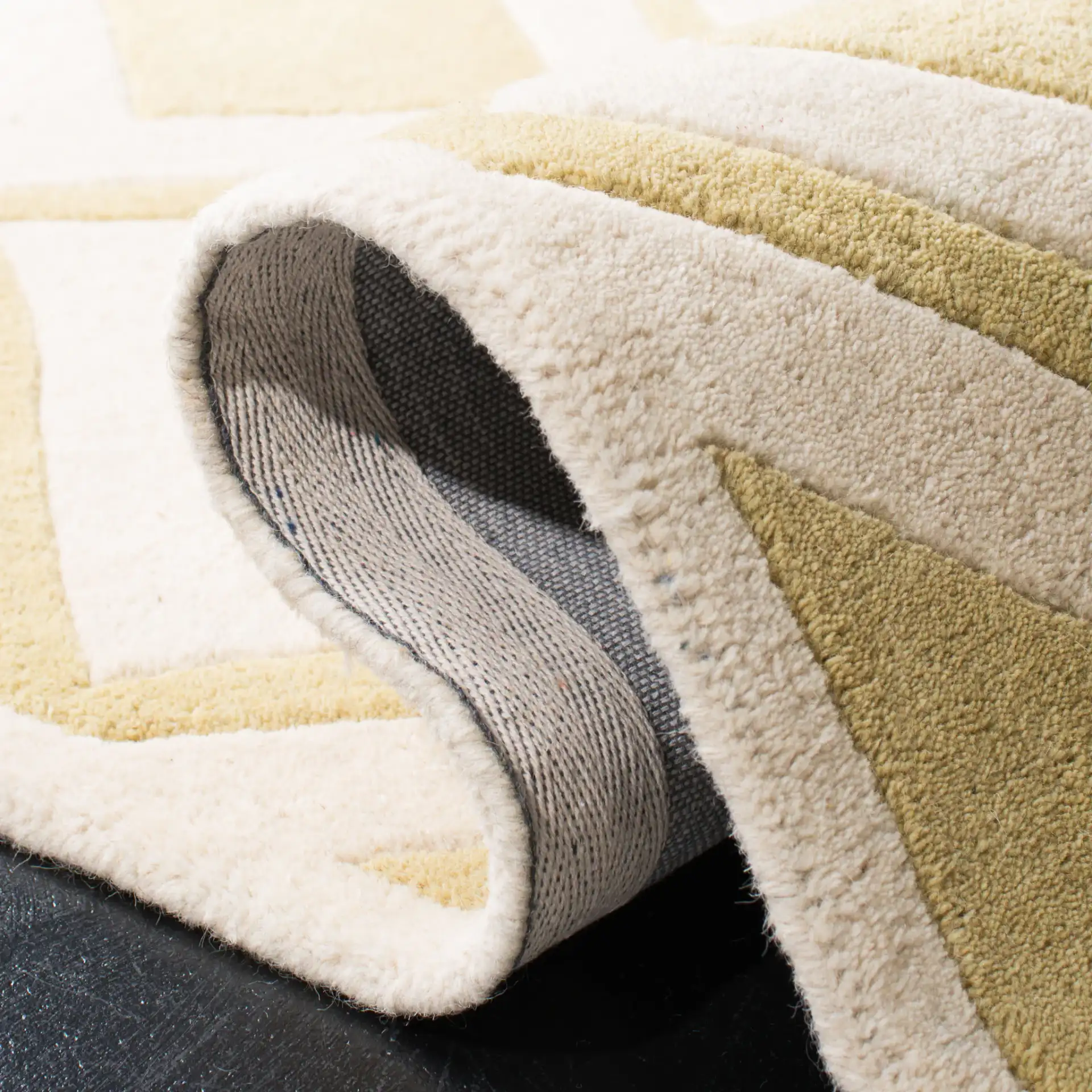 Chatham Nested Diamond Grid Hand-Tufted Wool Rug in Gold / Ivory in a styled room