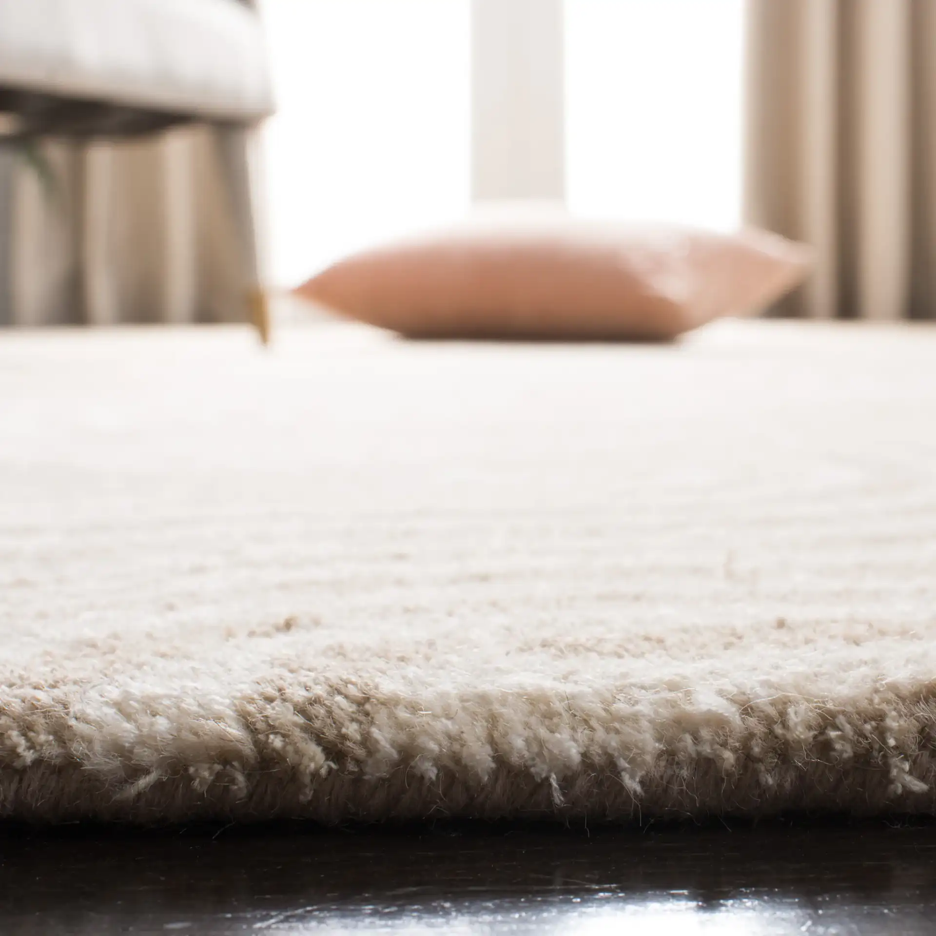 Chatham Wavy Stripe Hand-Tufted Wool Rug in Beige / Ivory in a styled room