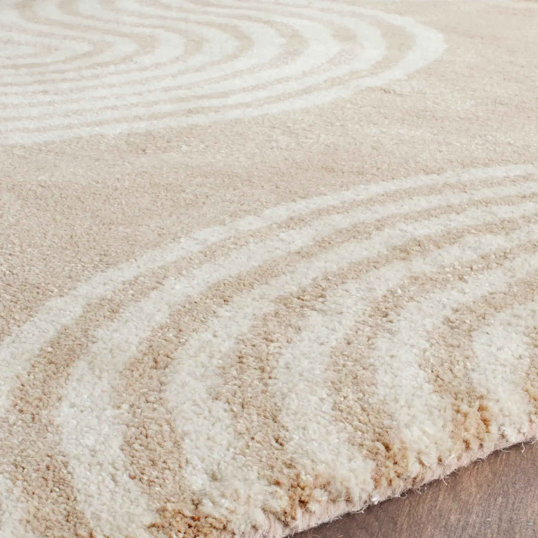 Chatham Wavy Stripe Hand-Tufted Wool Rug in Beige / Ivory in a styled room