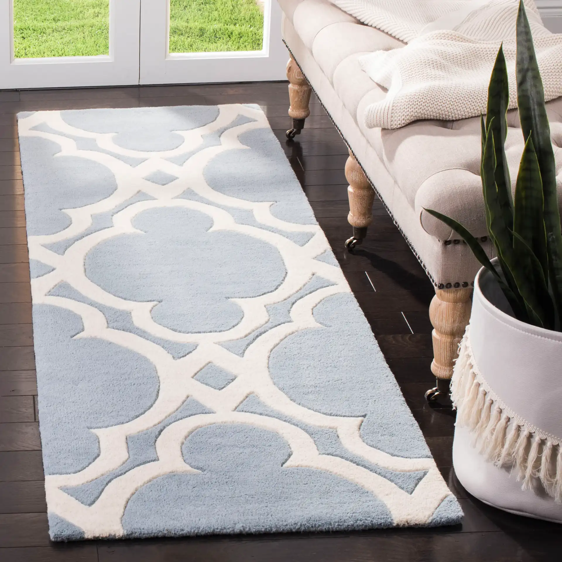 Chatham Moroccan Quatrefoil Hand-Tufted Wool Rug in Blue / Ivory in a styled room