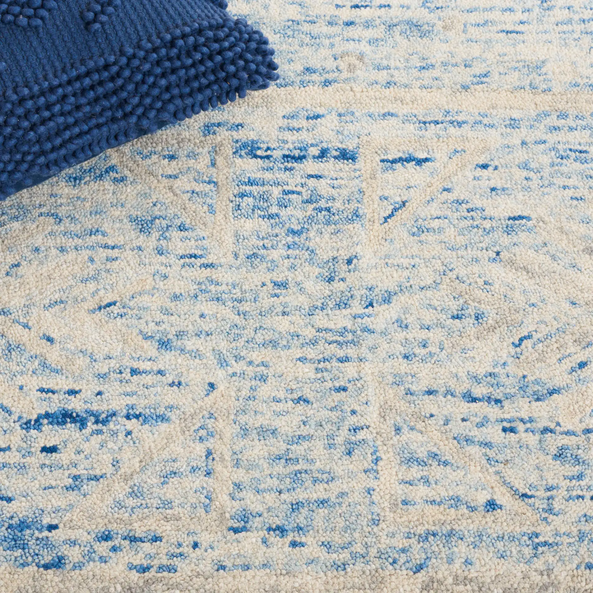 Chatham Banded Tribal Hand-Tufted Wool Rug in Blue / Ivory in a styled room