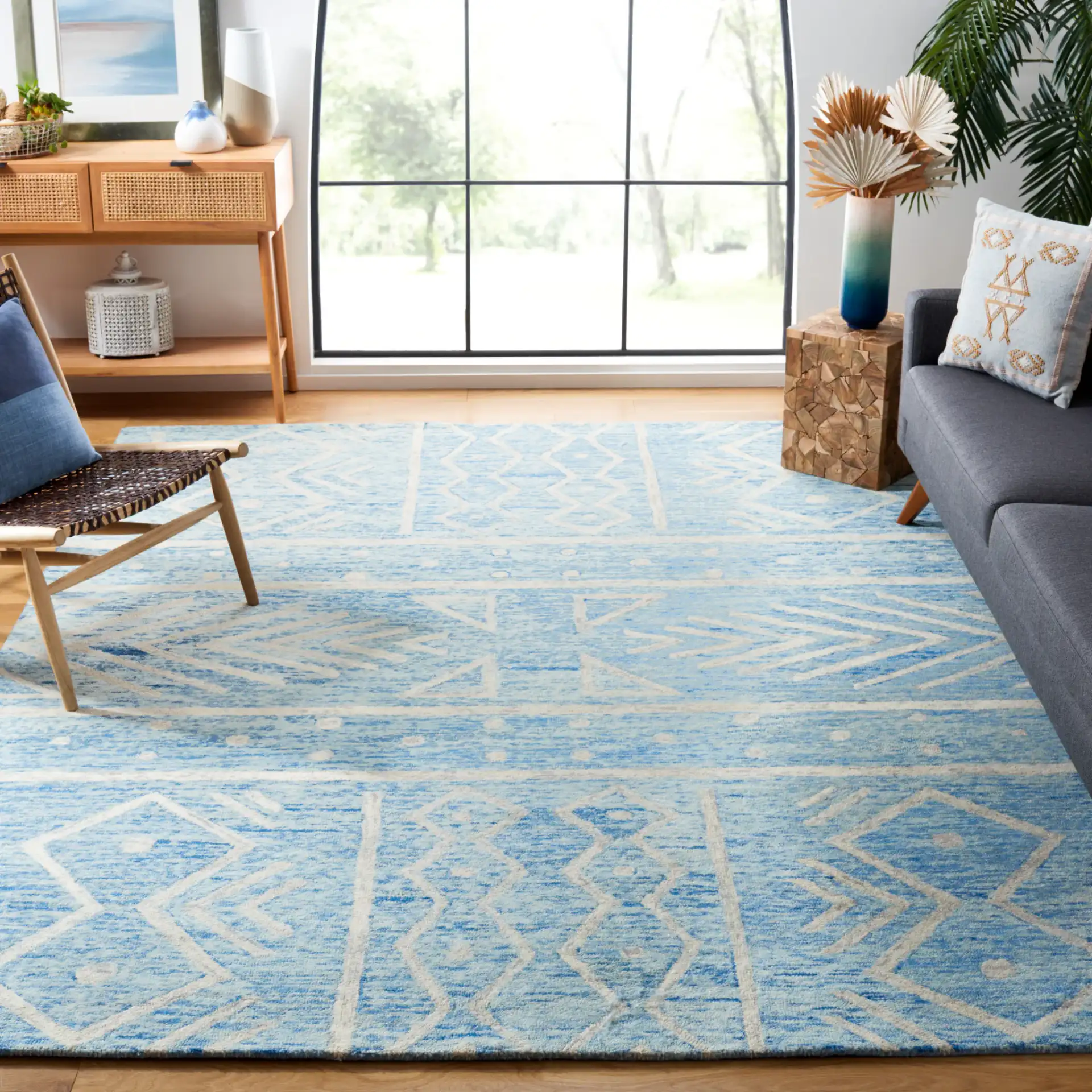 Chatham Banded Tribal Hand-Tufted Wool Rug in Blue / Ivory in a styled room