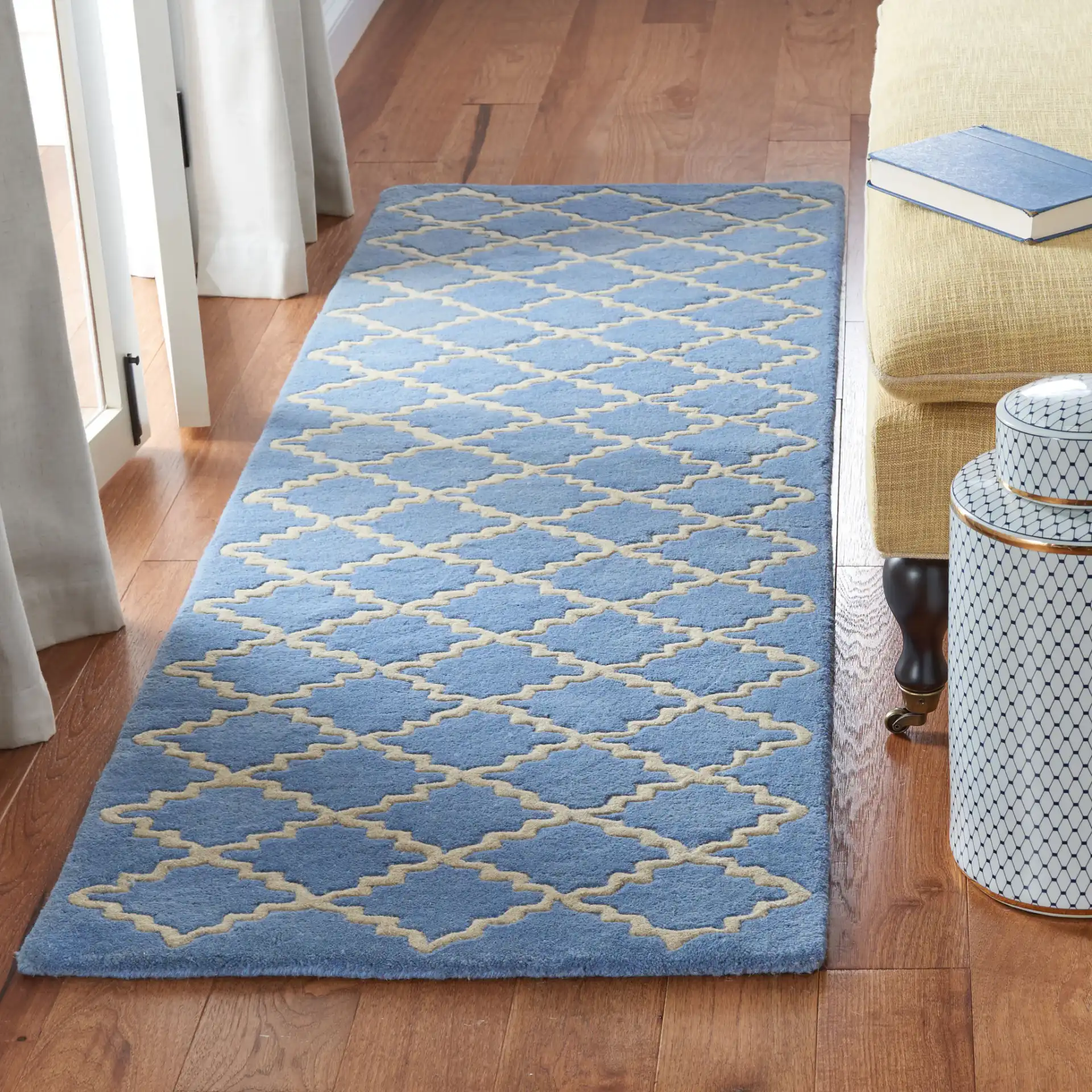 Chatham Notched Trellis Hand-Tufted Wool Rug in Blue Gray in a styled room