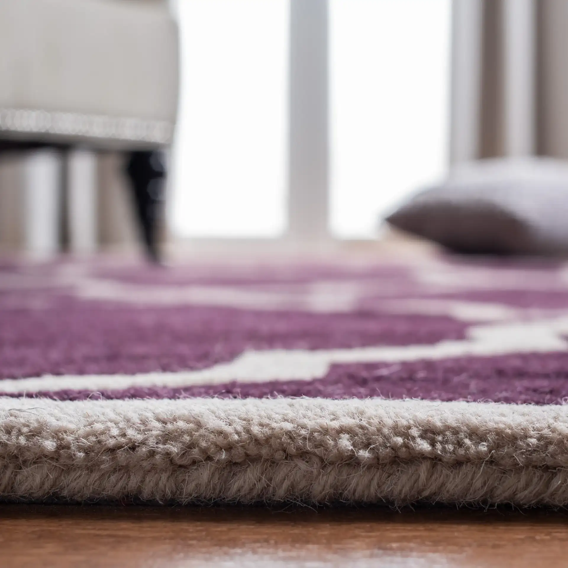 Chatham Stepped Diamond Trellis Hand-Tufted Wool Rug in Dark Purple in a styled room