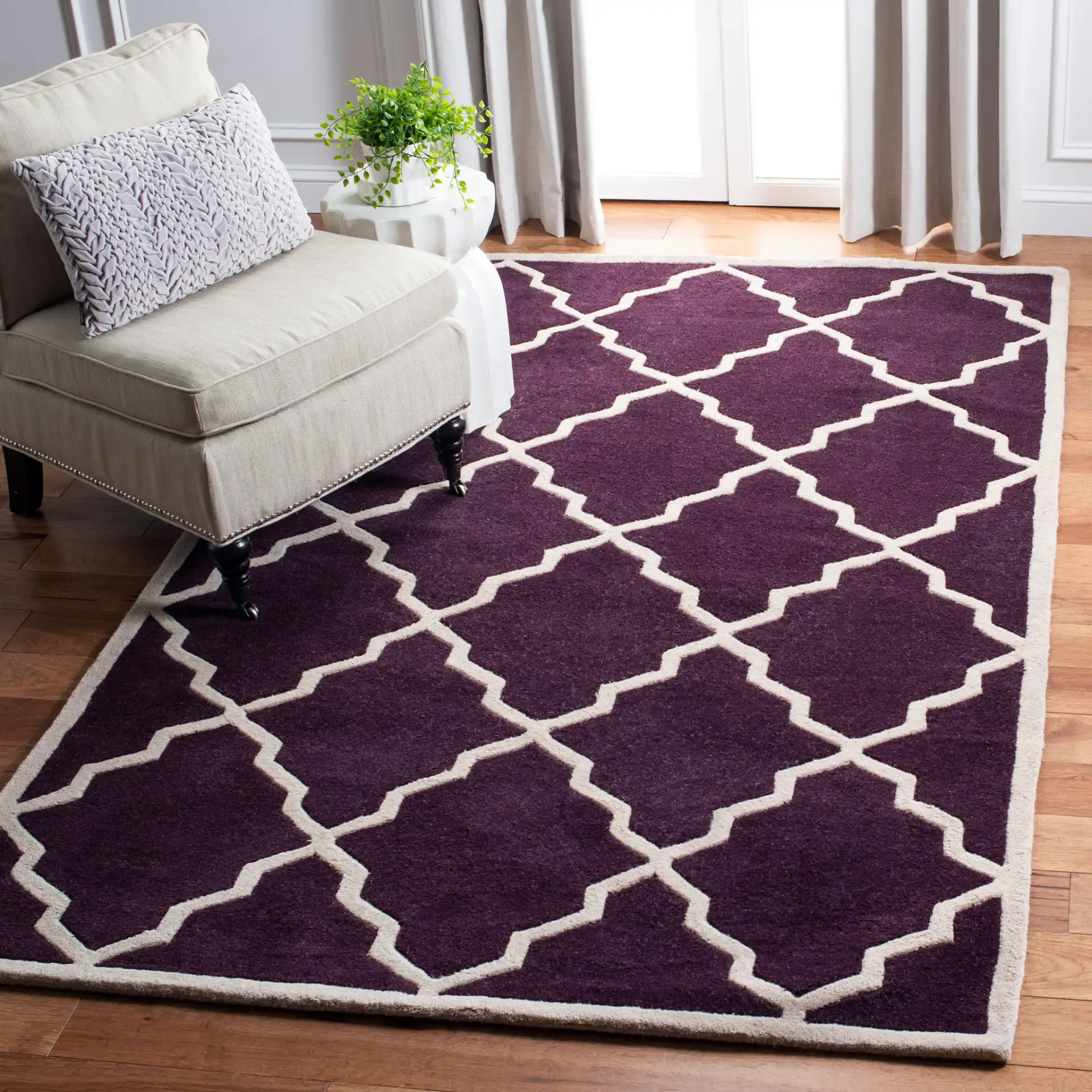 Chatham Stepped Diamond Trellis Hand-Tufted Wool Rug in Dark Purple in a styled room