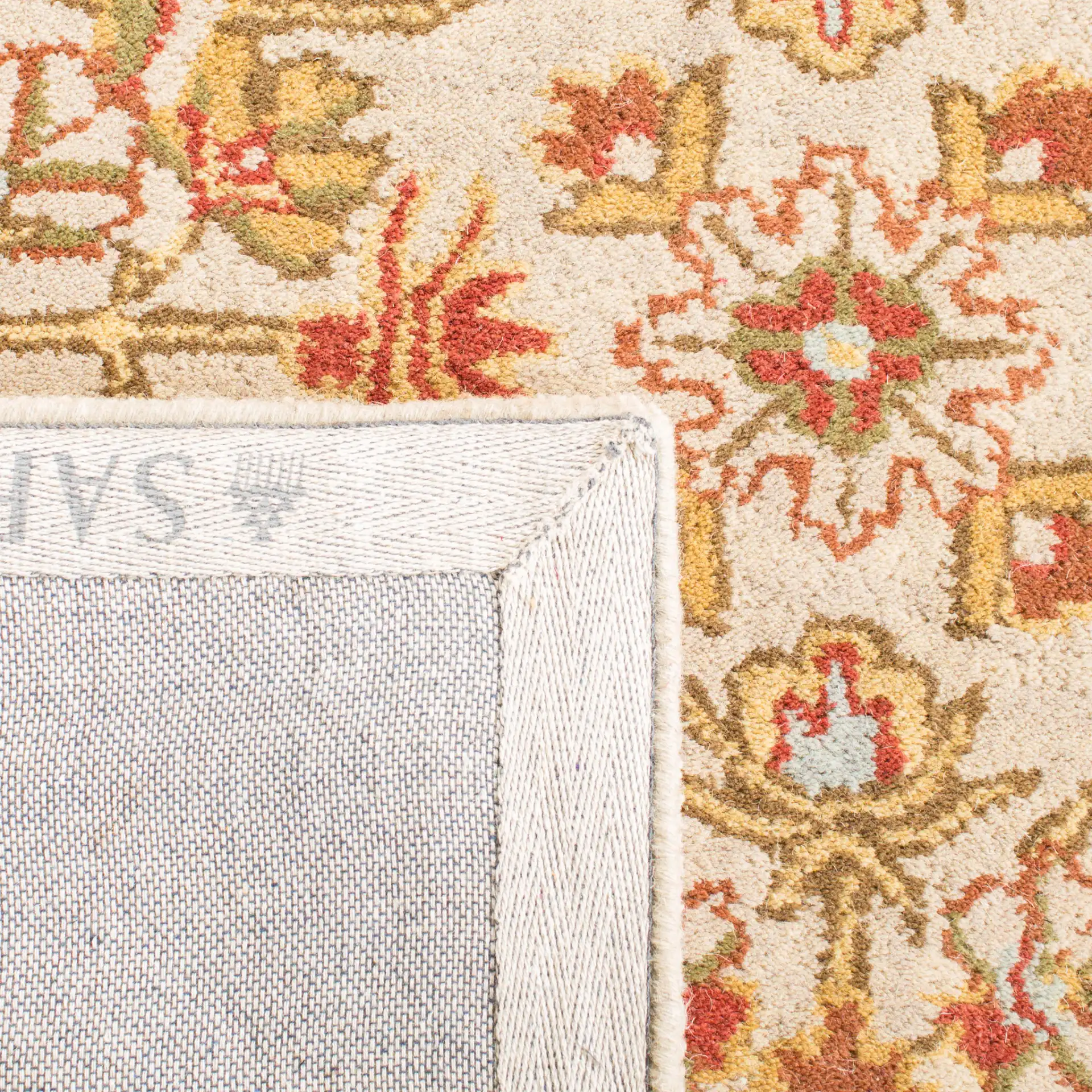 Classic Traditional Scroll Bordered Hand-Tufted Wool Rug in Gray / Light Gold in a styled room