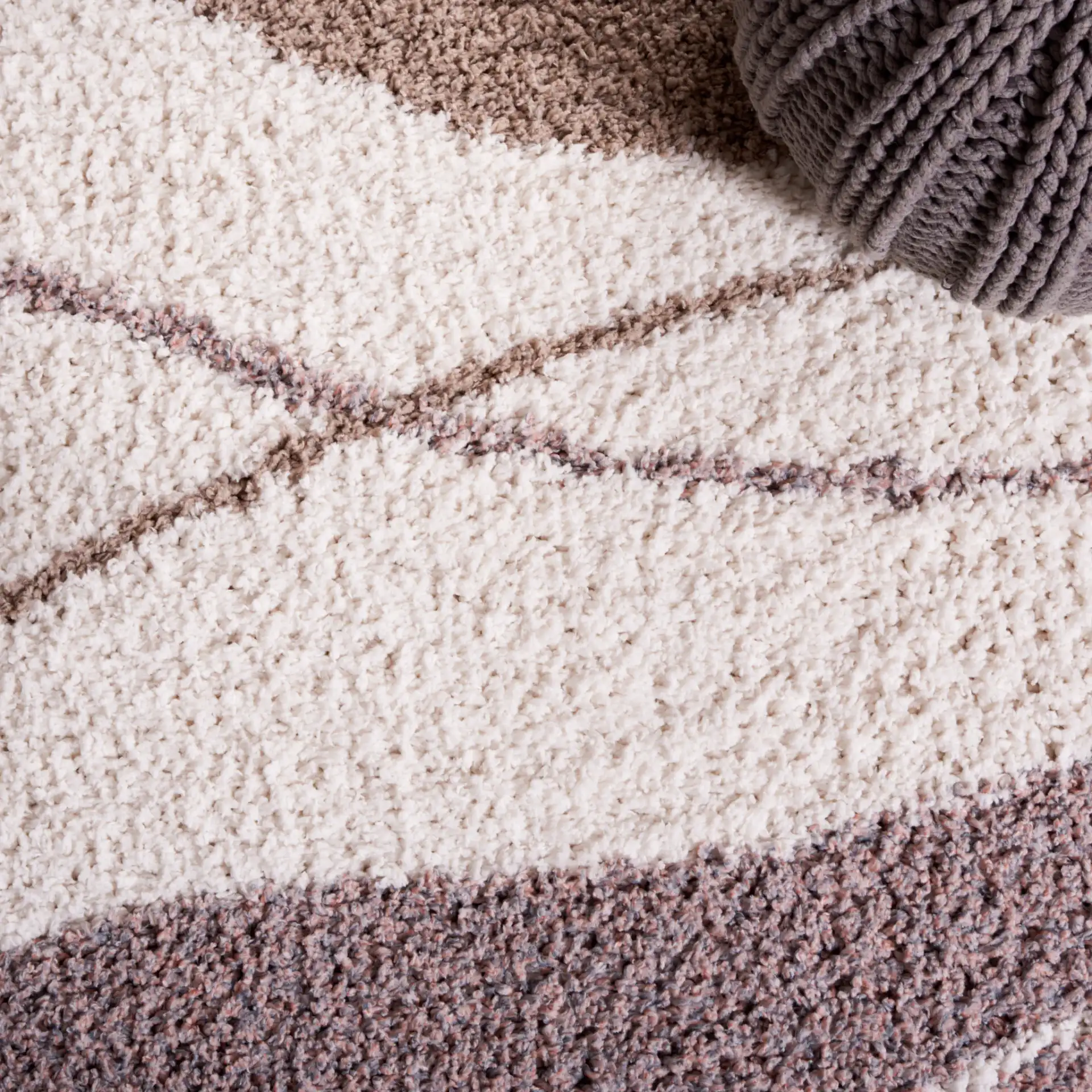 Calico Wave Shag Rug in Taupe / Blue in a styled room