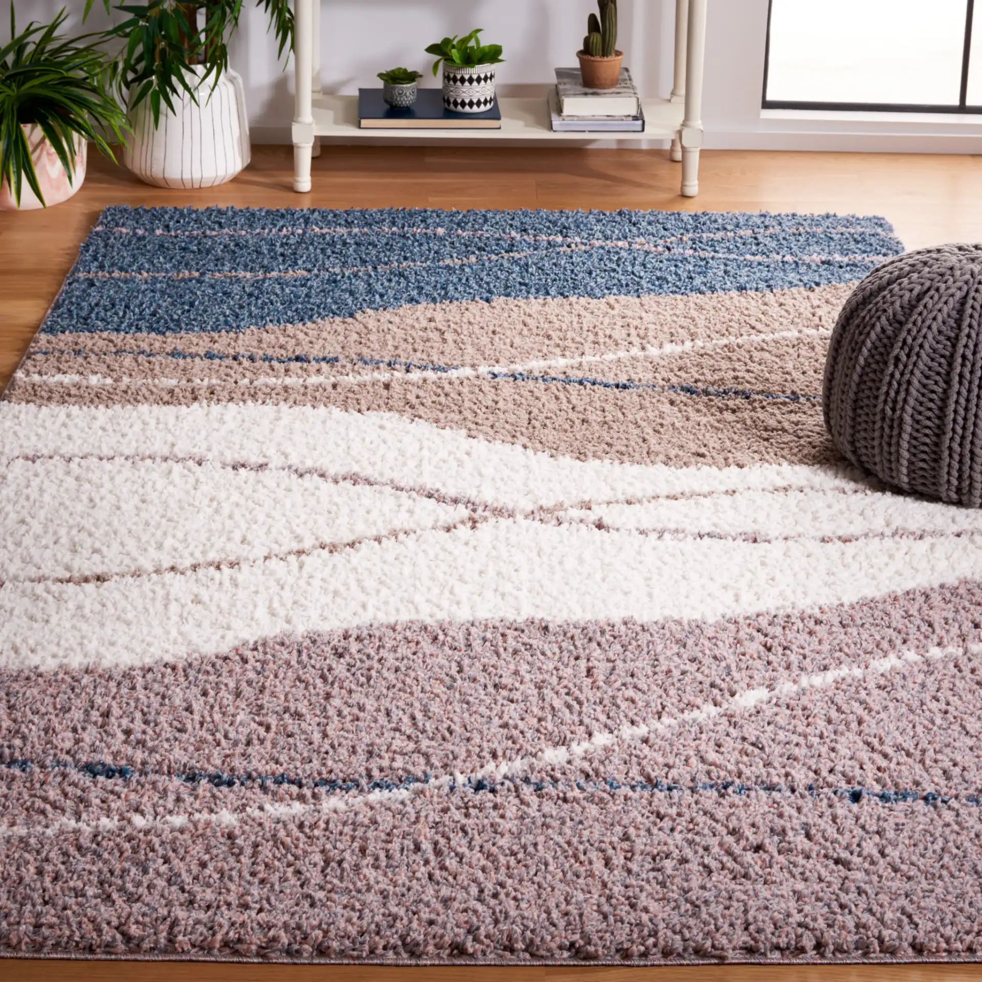 Calico Wave Shag Rug in Taupe / Blue in a styled room