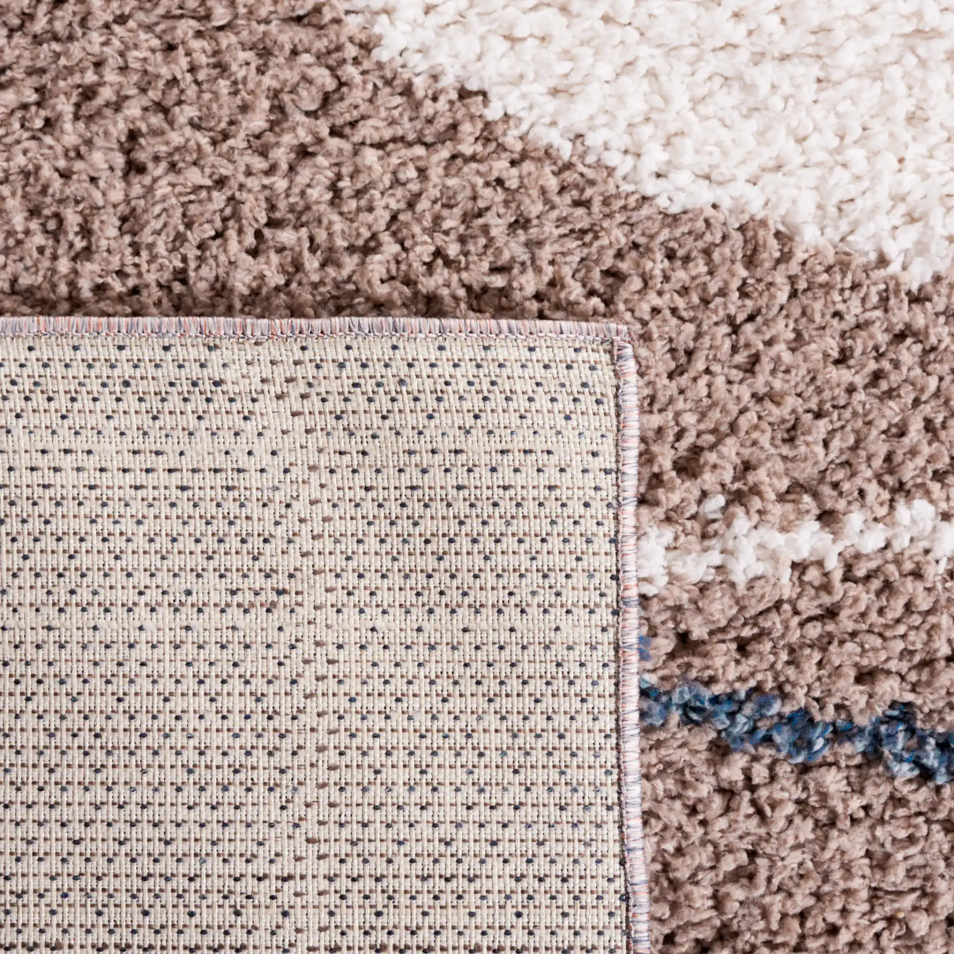 Calico Wave Shag Rug in Taupe / Blue in a styled room