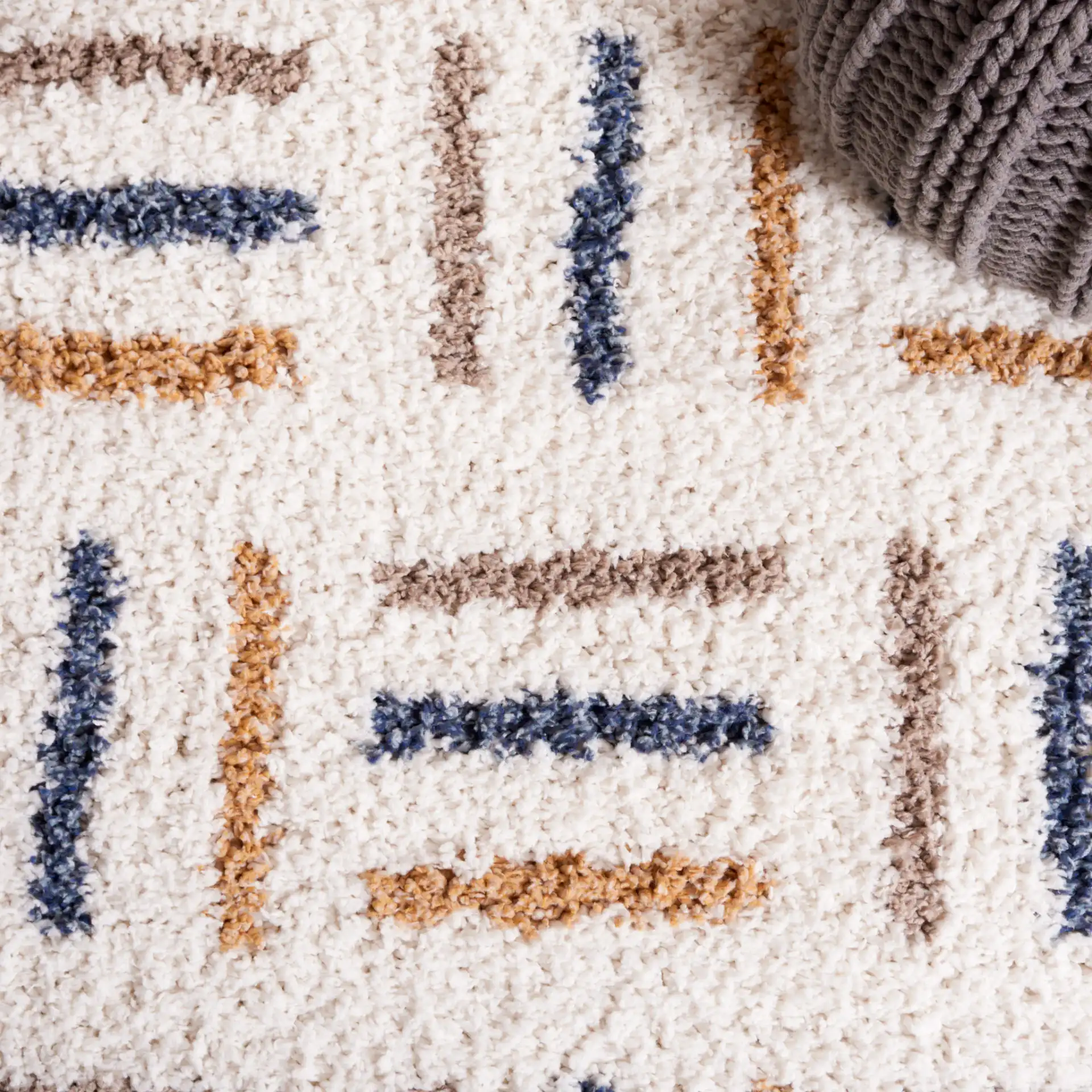 Calico Basketweave Shag Rug in Ivory / Gold in a styled room