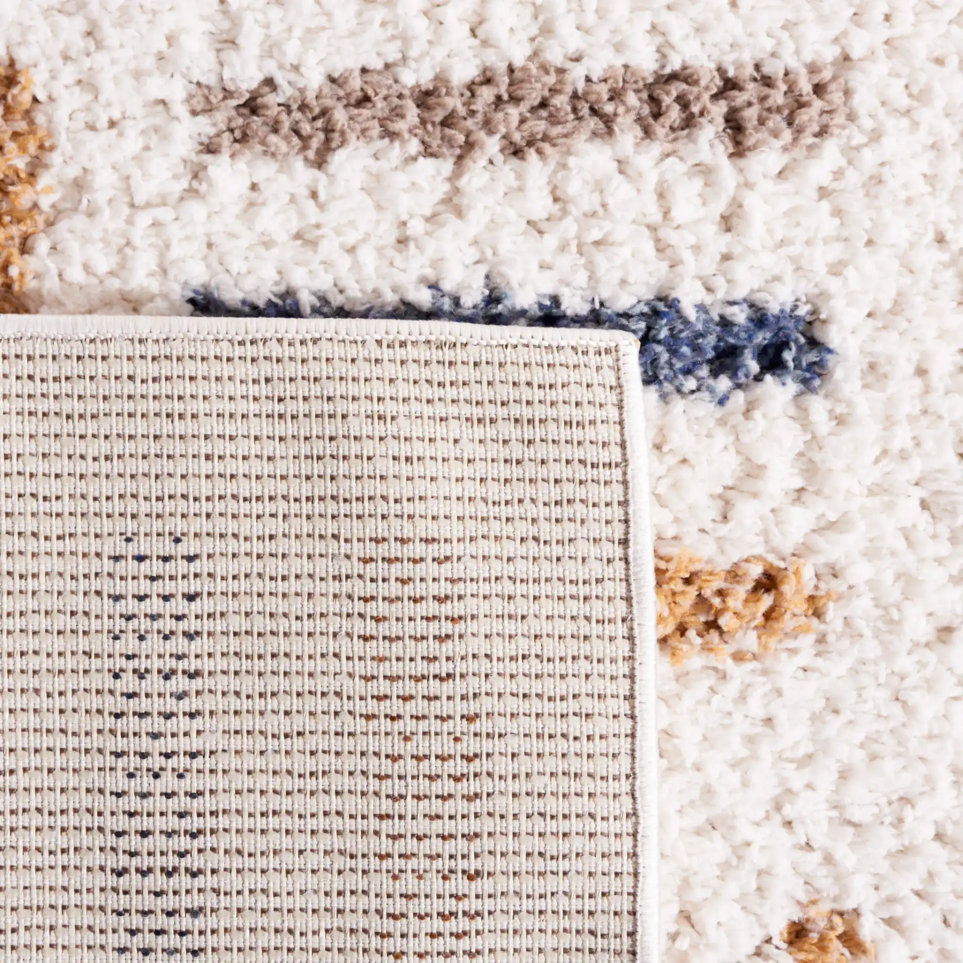 Calico Basketweave Shag Rug in Ivory / Gold in a styled room