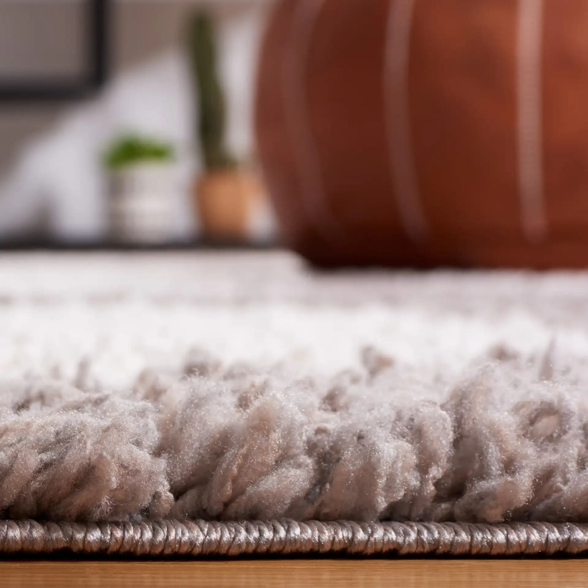 Calico Polka Dot Shag Rug in Gray / Ivory in a styled room