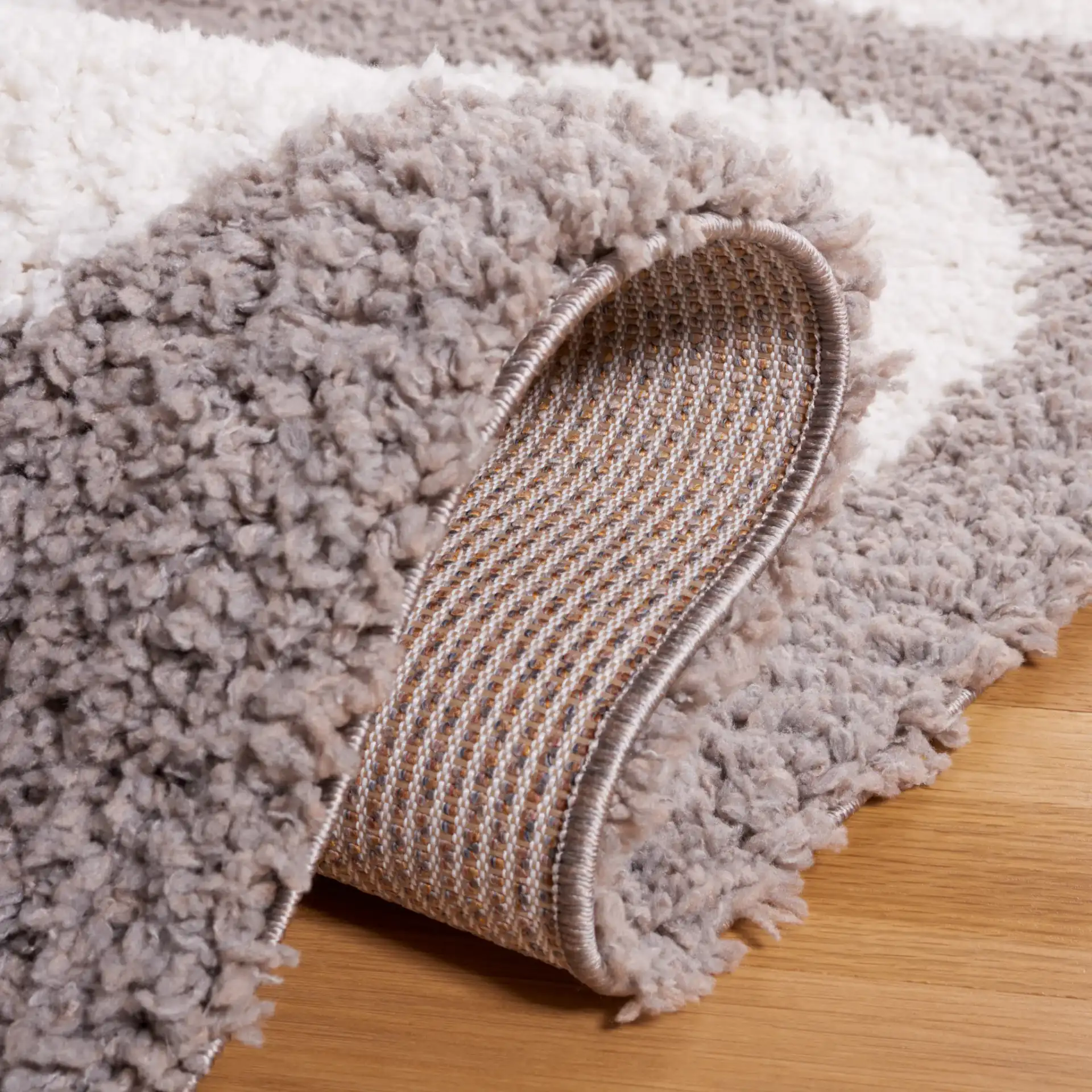 Calico Polka Dot Shag Rug in Gray / Ivory in a styled room