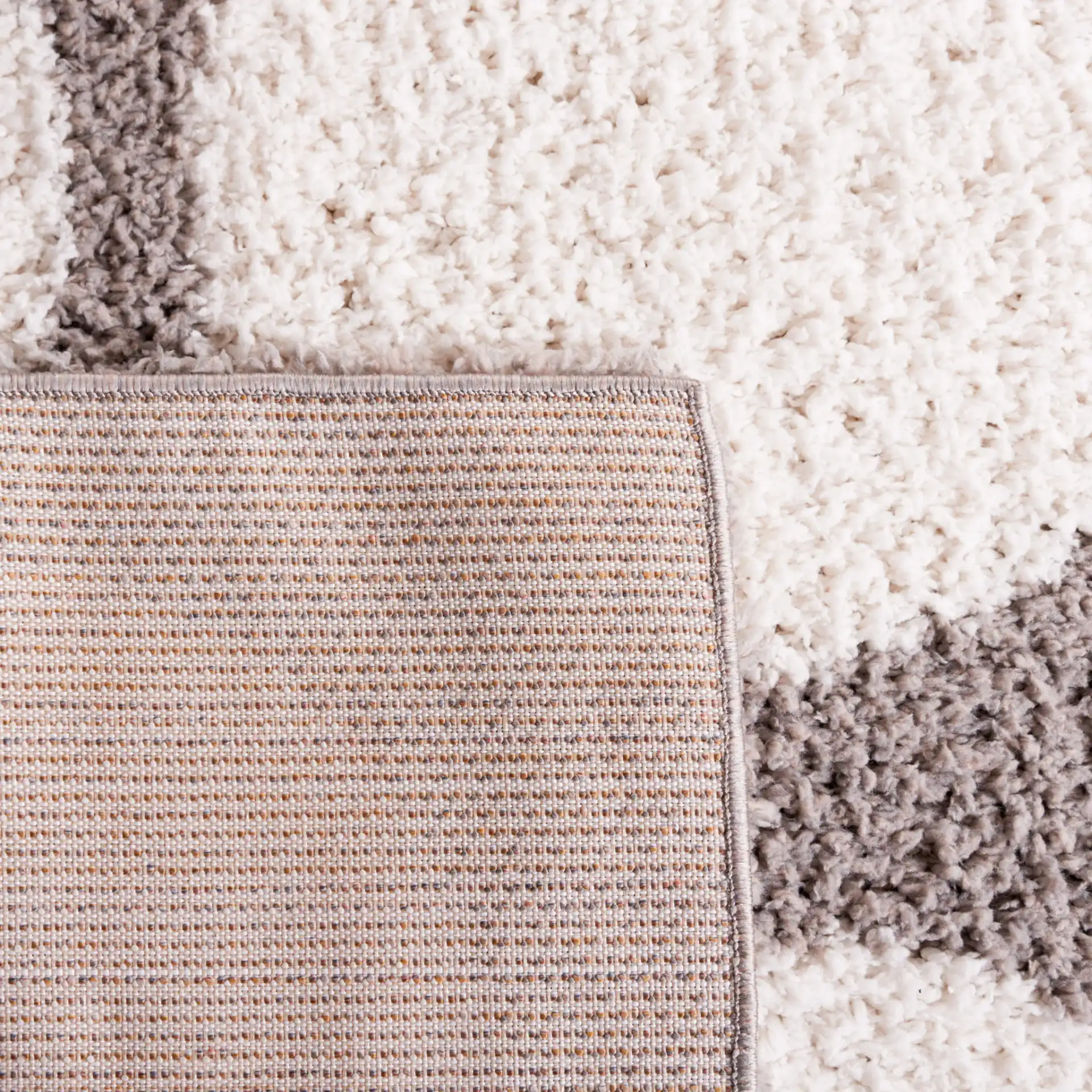 Calico Polka Dot Shag Rug in Gray / Ivory in a styled room