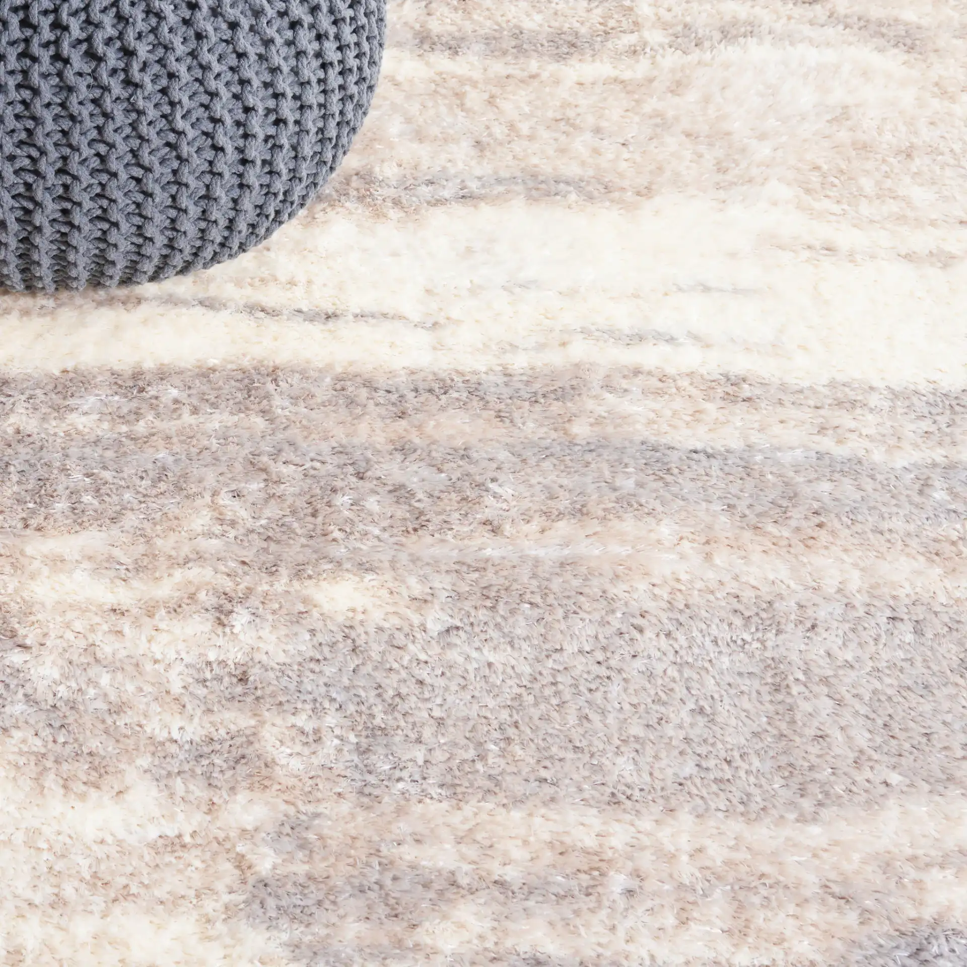 Cloud Abstract Shag Rug in Ivory / Gray in a styled room