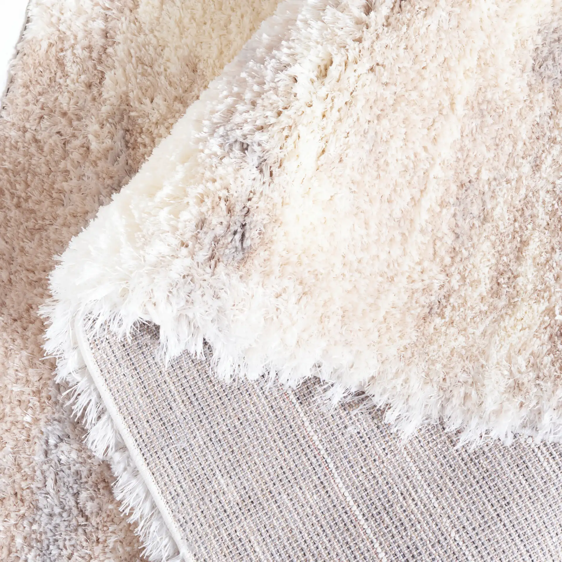 Cloud Abstract Shag Rug in Ivory / Gray in a styled room