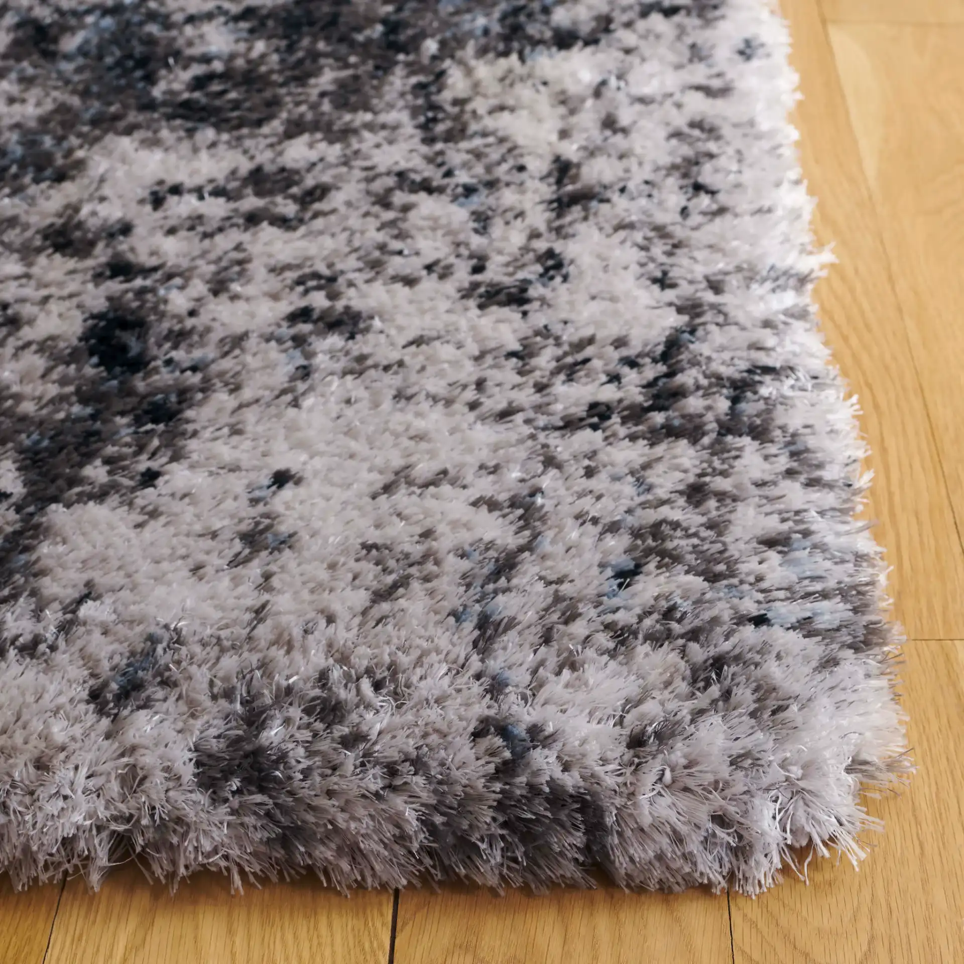 Cloud Mottled Shag Rug in Gray / Blue in a styled room