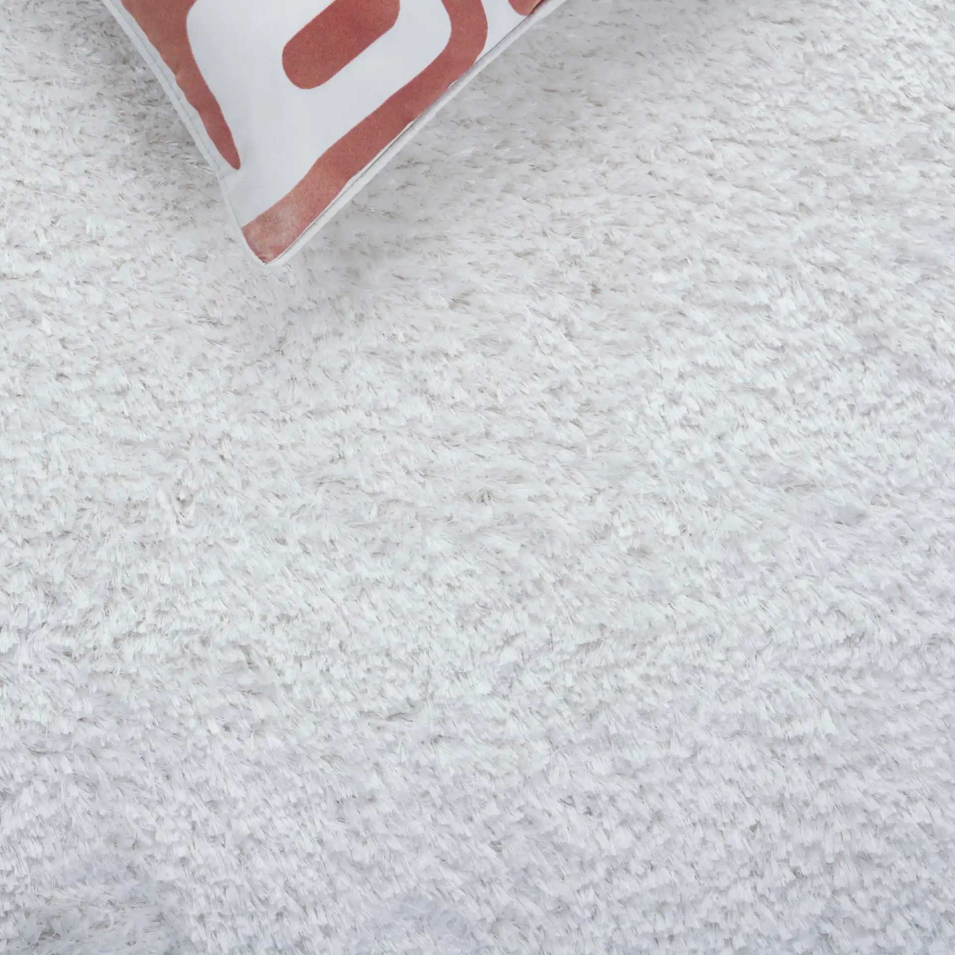 Cloud Solid Shag Rug in White in a styled room