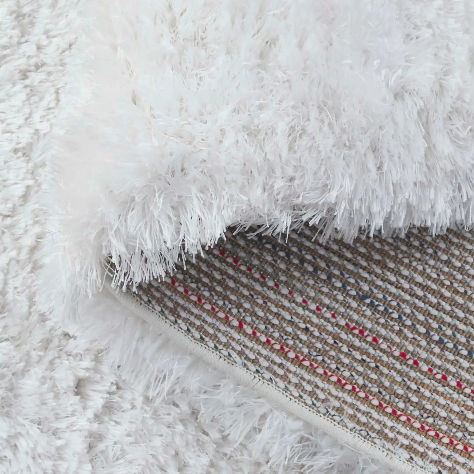 Cloud Solid Shag Rug in White in a styled room