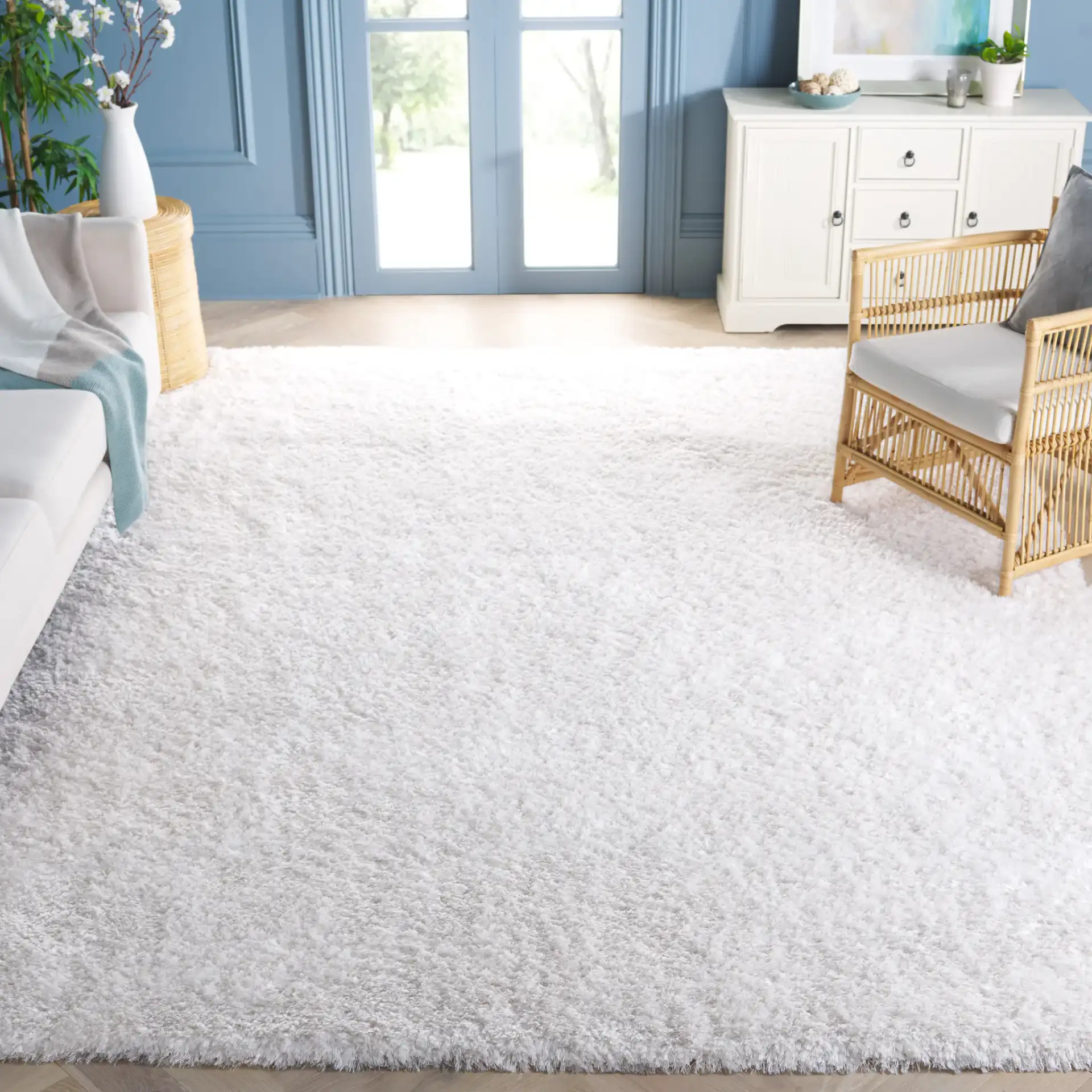 Cloud Solid Shag Rug in White in a styled room