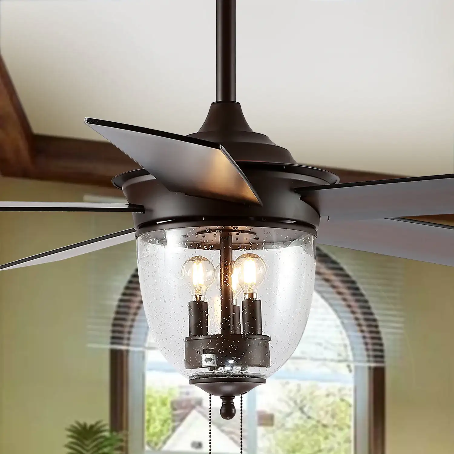 Rallen Three-Light 52" Ceiling Fan in Oil Rub Bronze in a styled room