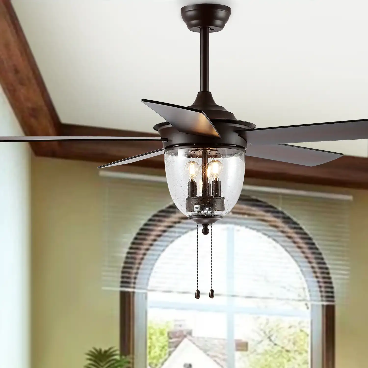 Rallen Three-Light 52" Ceiling Fan in Oil Rub Bronze in a styled room