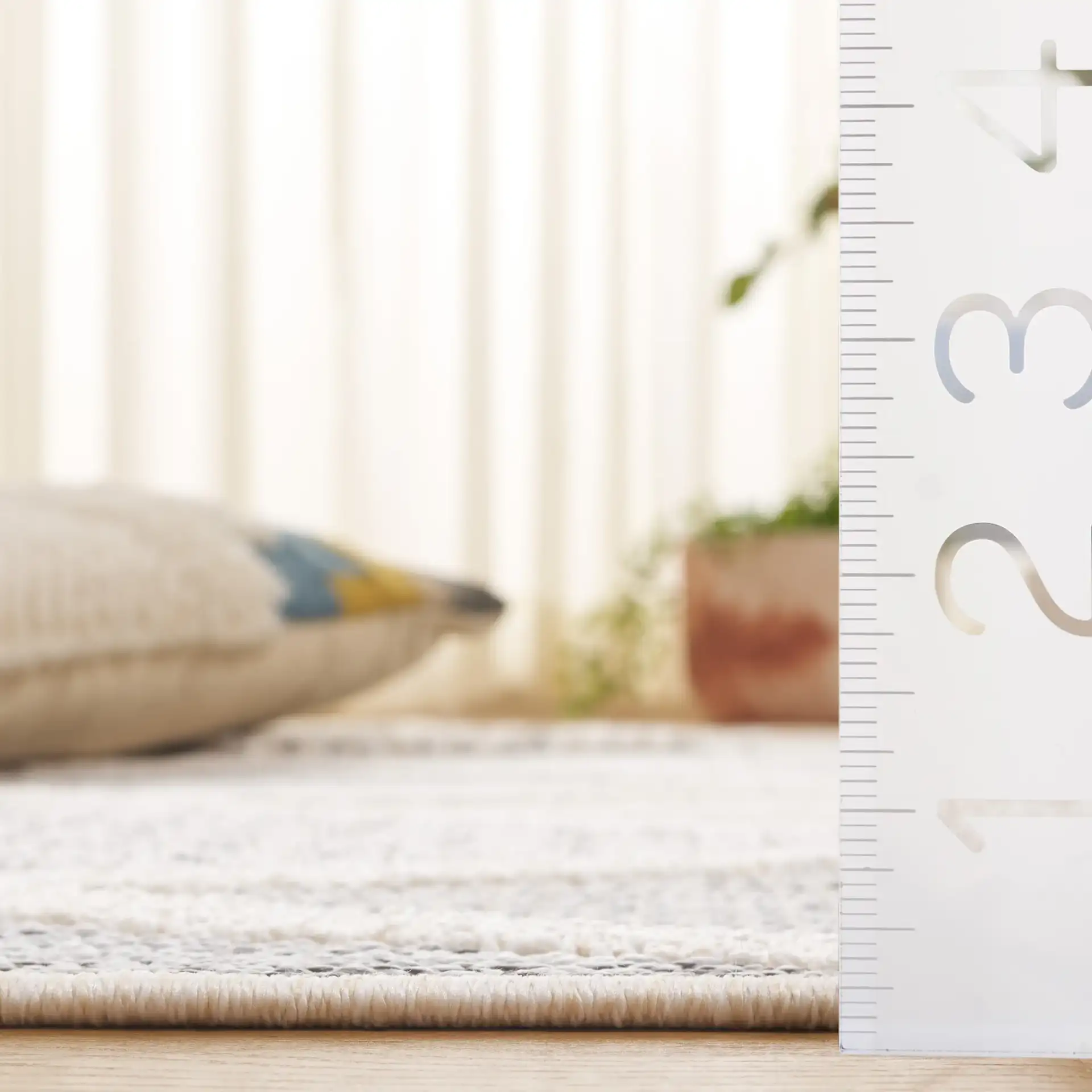 Chloe Diamond Lattice Rug in Ivory / Gray in a styled room
