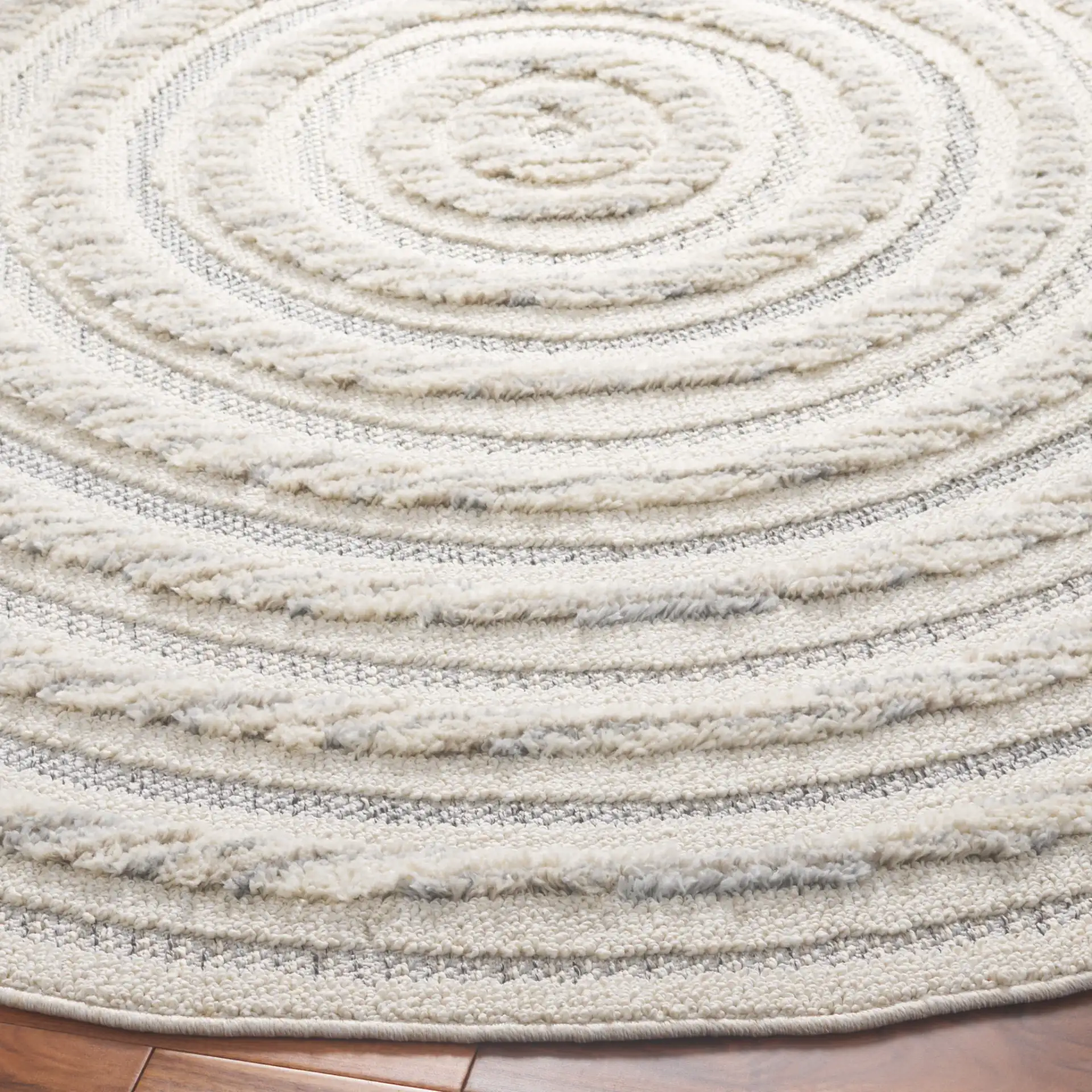 Chloe Concentric Square Rug in Ivory / Gray in a styled room