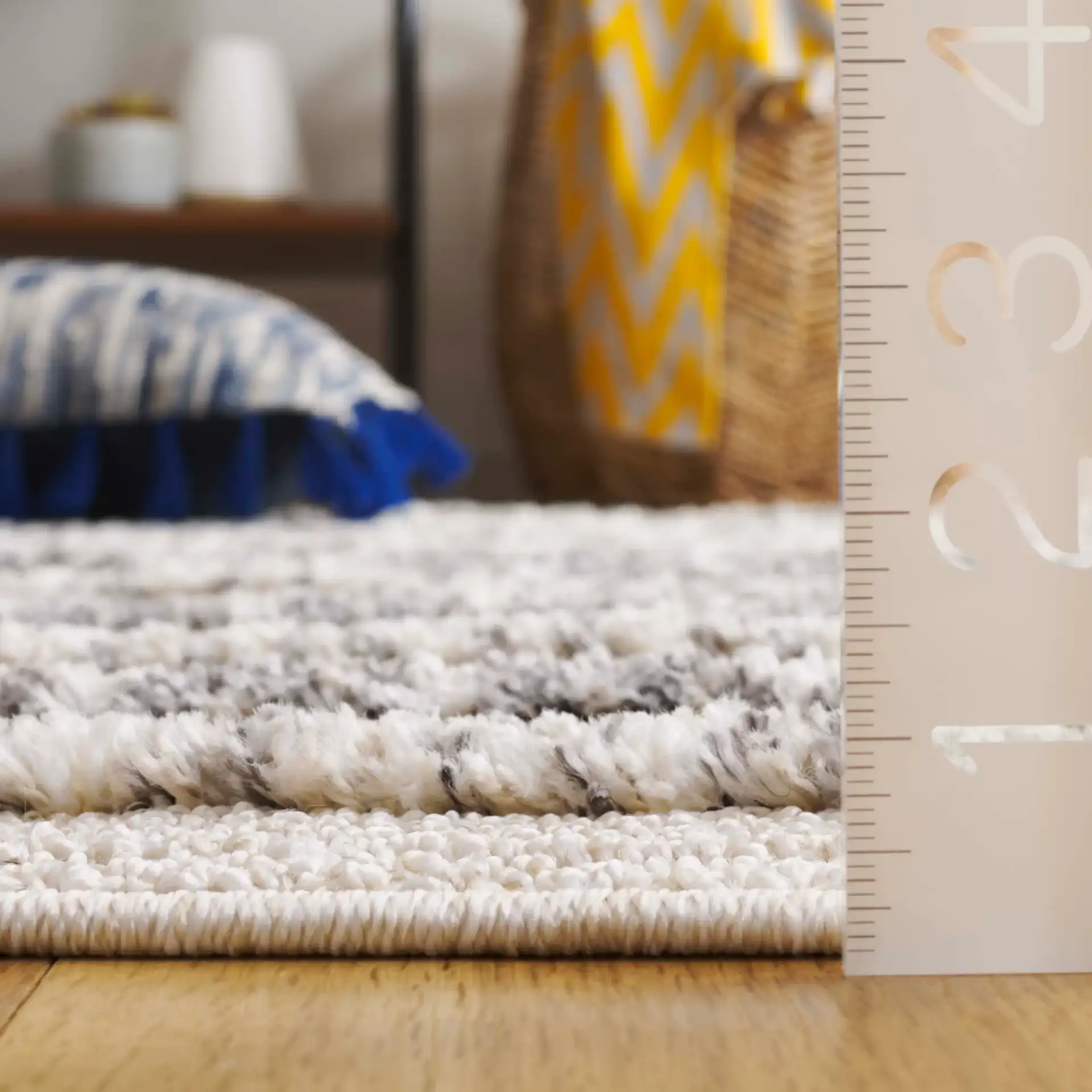Chloe Concentric Square Rug in Ivory / Gray in a styled room