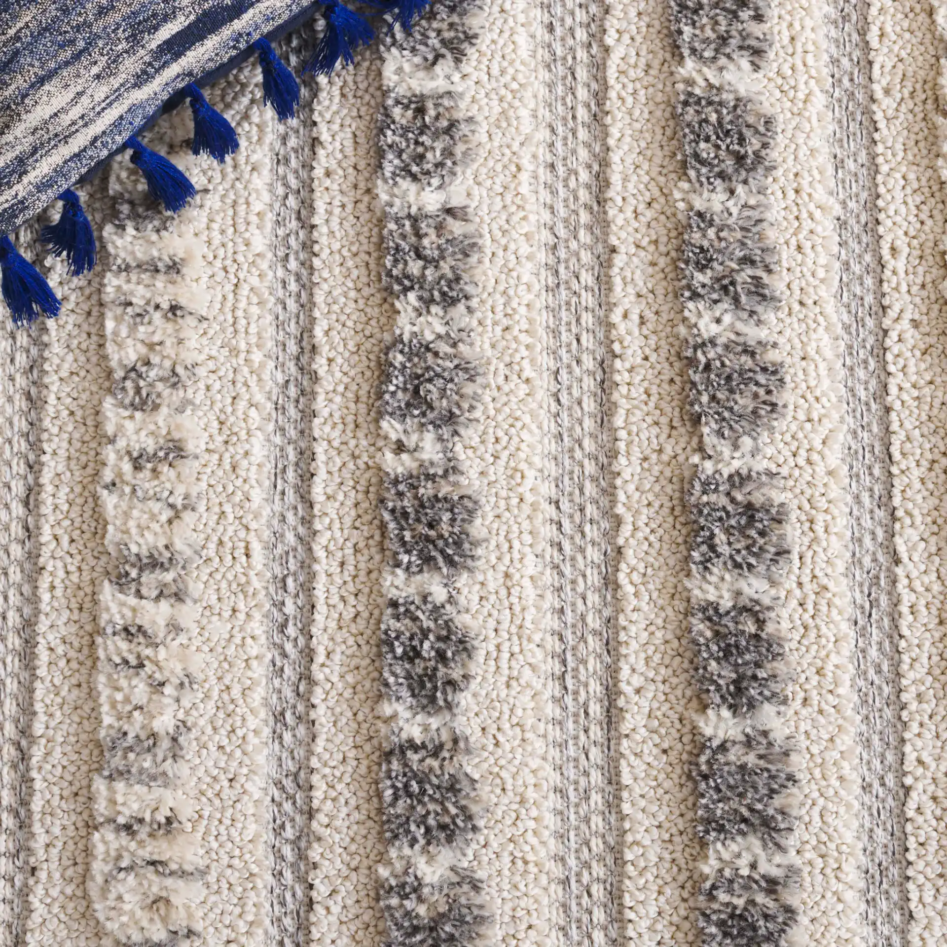 Chloe Concentric Square Rug in Ivory / Gray in a styled room