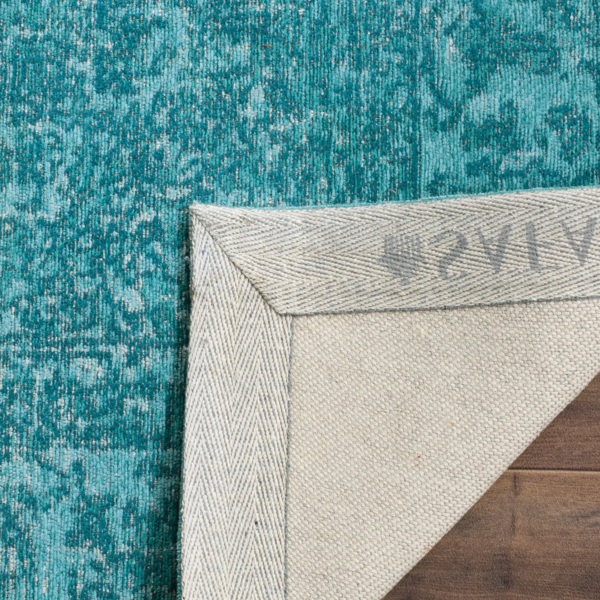 Classic Vintage Floral Medallion Rug in Aqua in a styled room