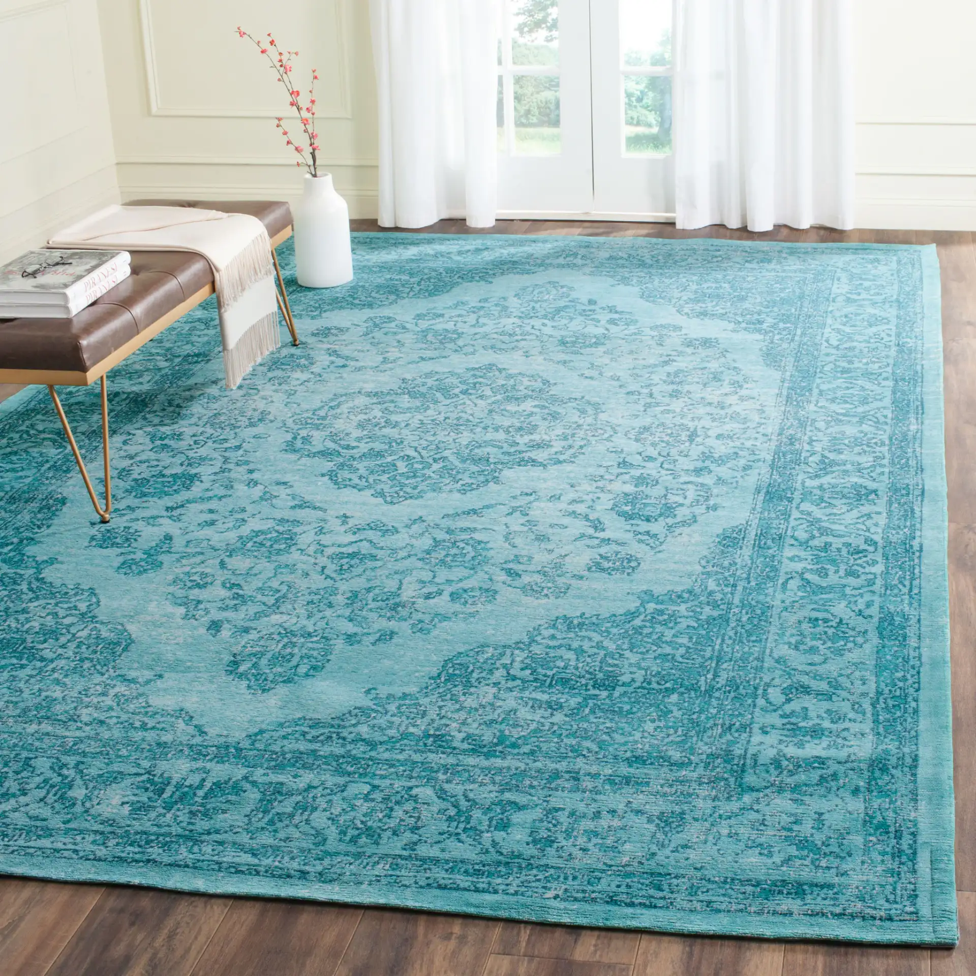 Classic Vintage Floral Medallion Rug in Aqua in a styled room
