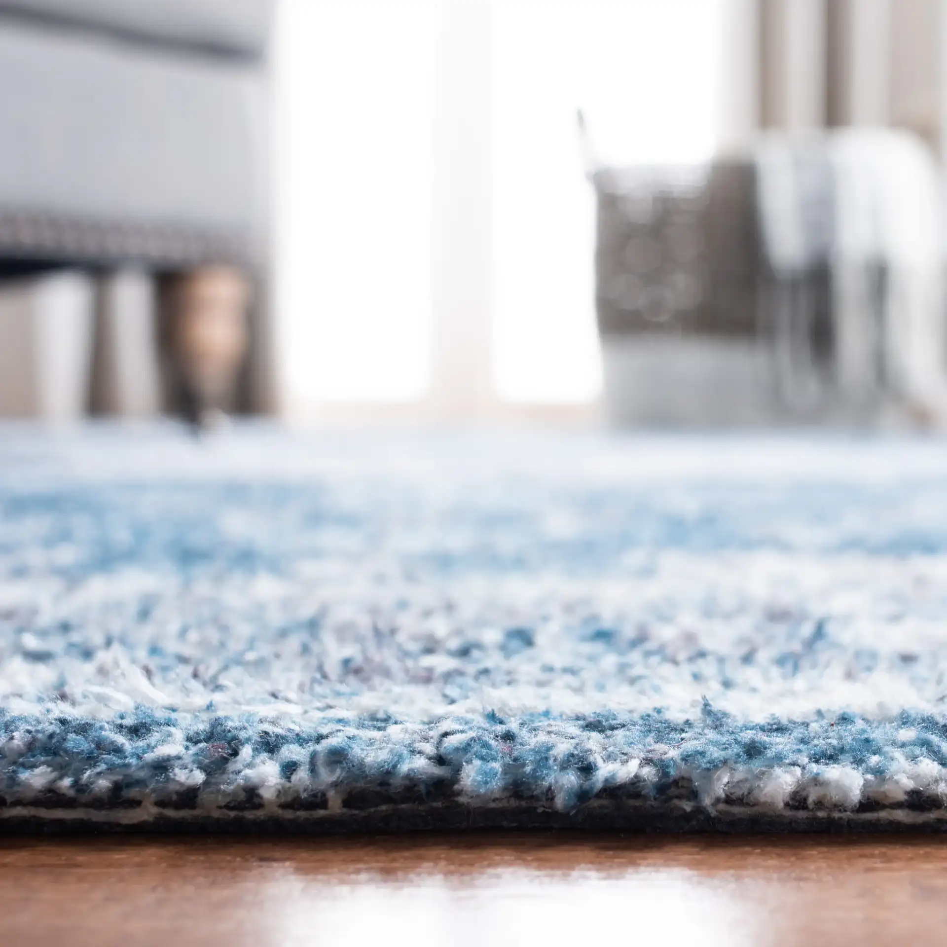 Classic Vintage Traditional Medallion Hand-Tufted Rug in Blue / Gray in a styled room
