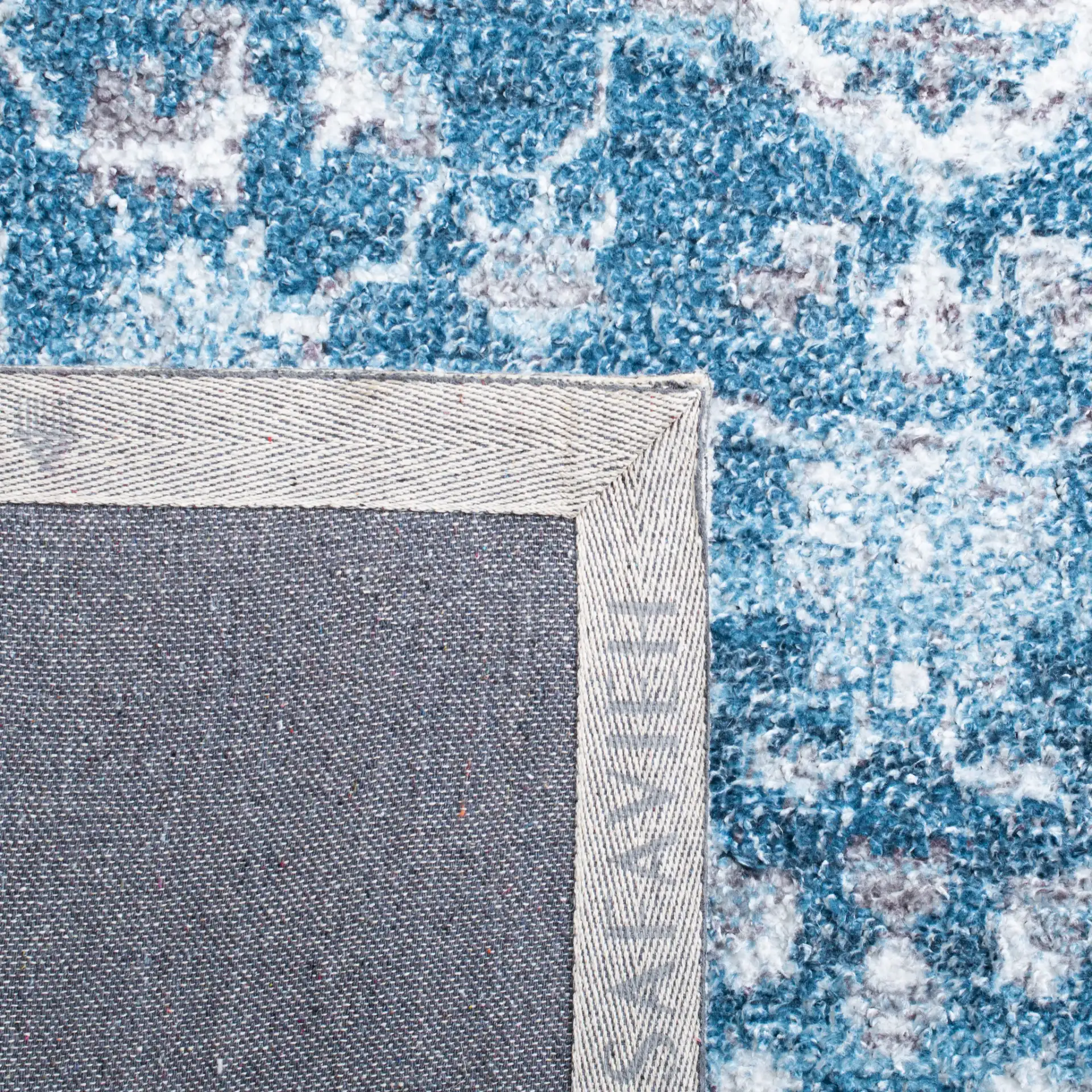 Classic Vintage Traditional Medallion Hand-Tufted Rug in Blue / Gray in a styled room