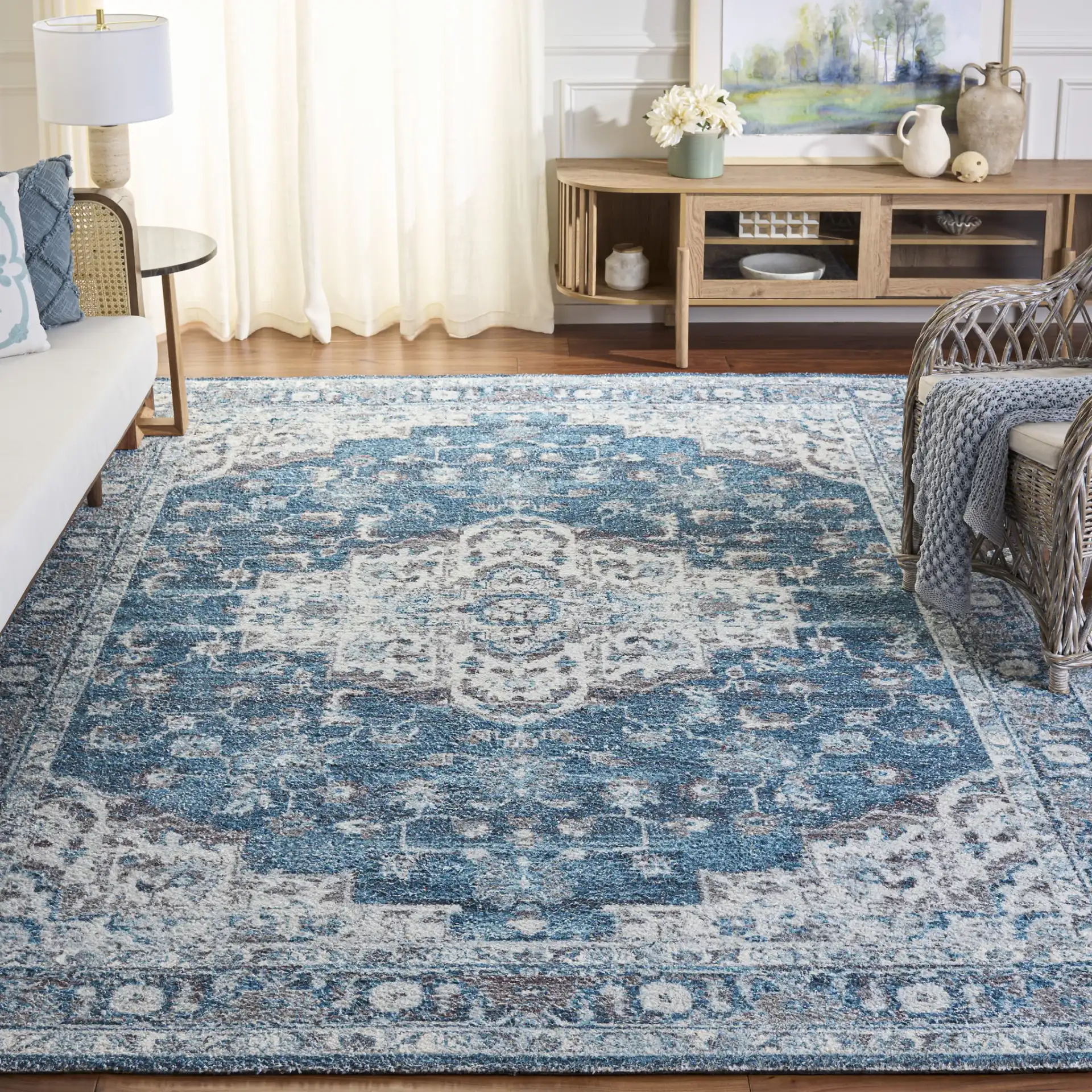 Classic Vintage Traditional Medallion Hand-Tufted Rug in Blue / Gray in a styled room