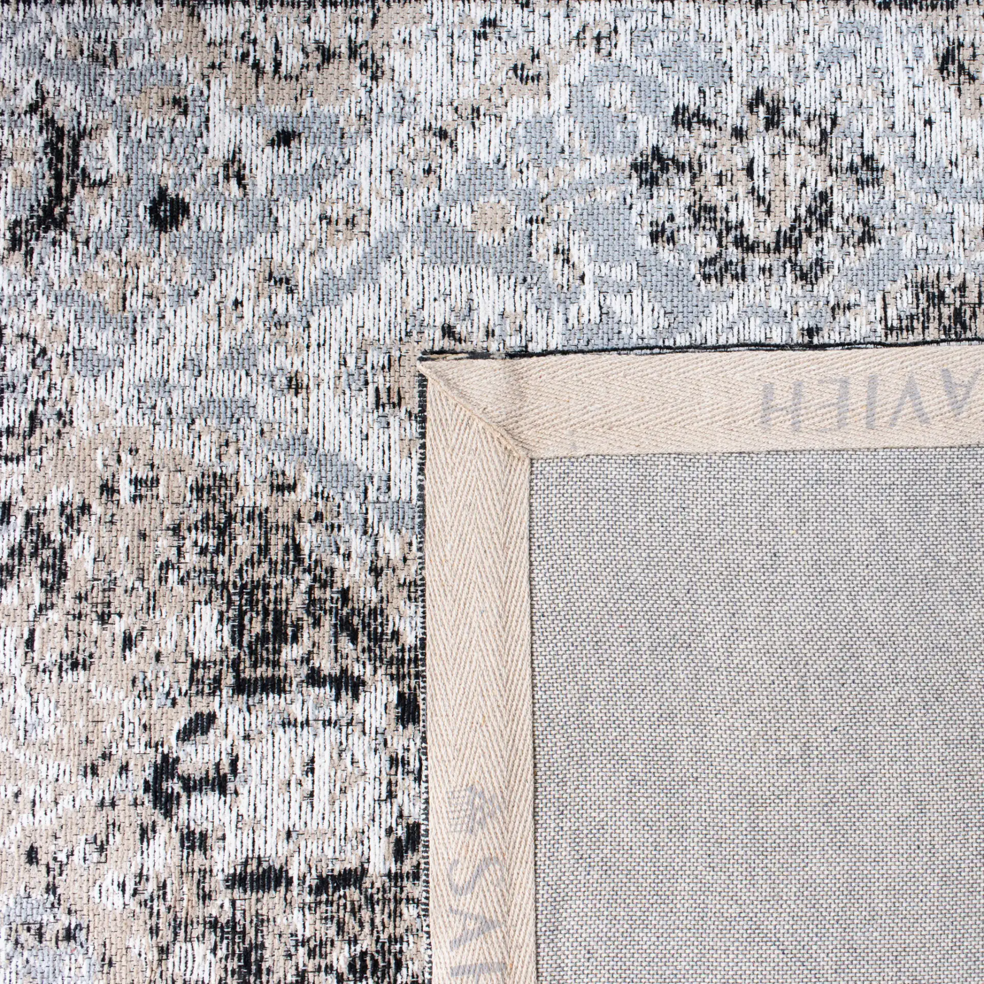 Classic Vintage Distressed Diamond Hand-Loomed Rug in Ivory / Silver in a styled room