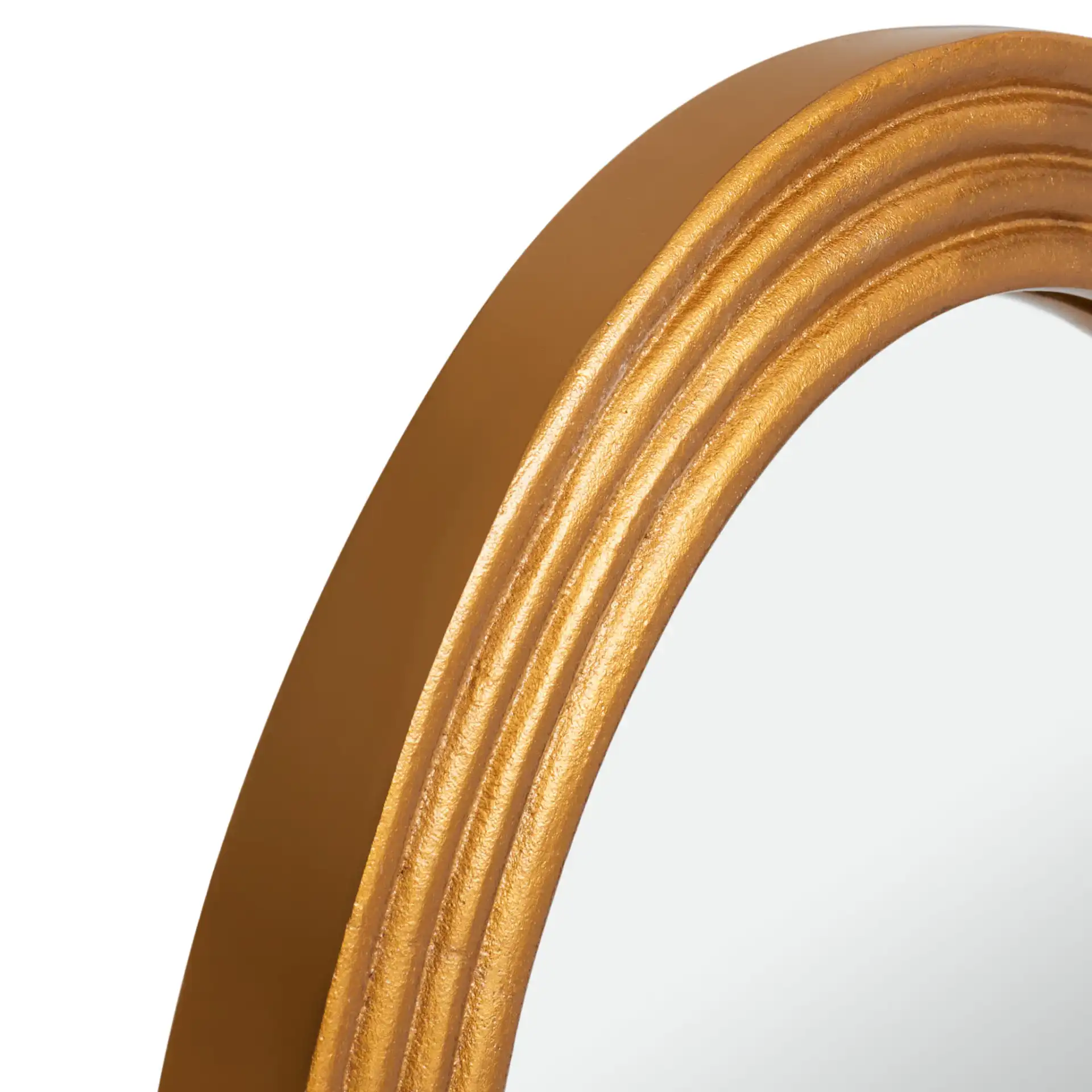 Jeanelle Oval Gold Mirror in Gold in a styled room