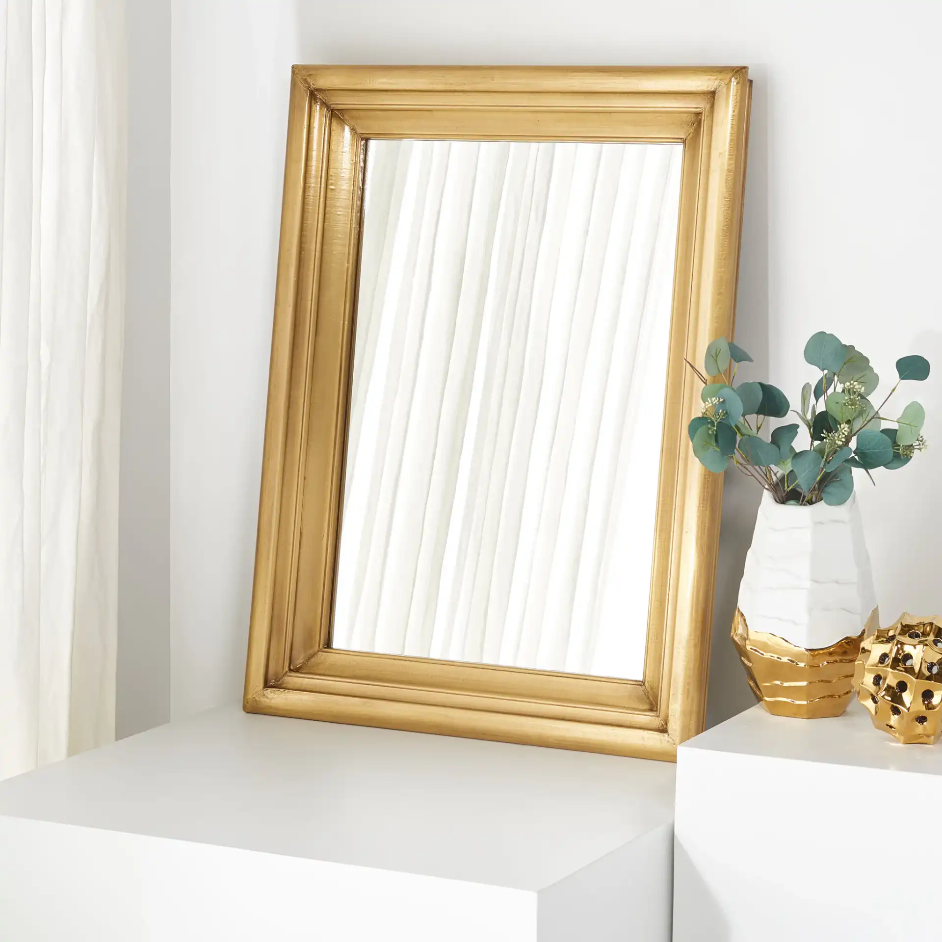 Francesca Small Rectangular Mirror in Silver in a styled room