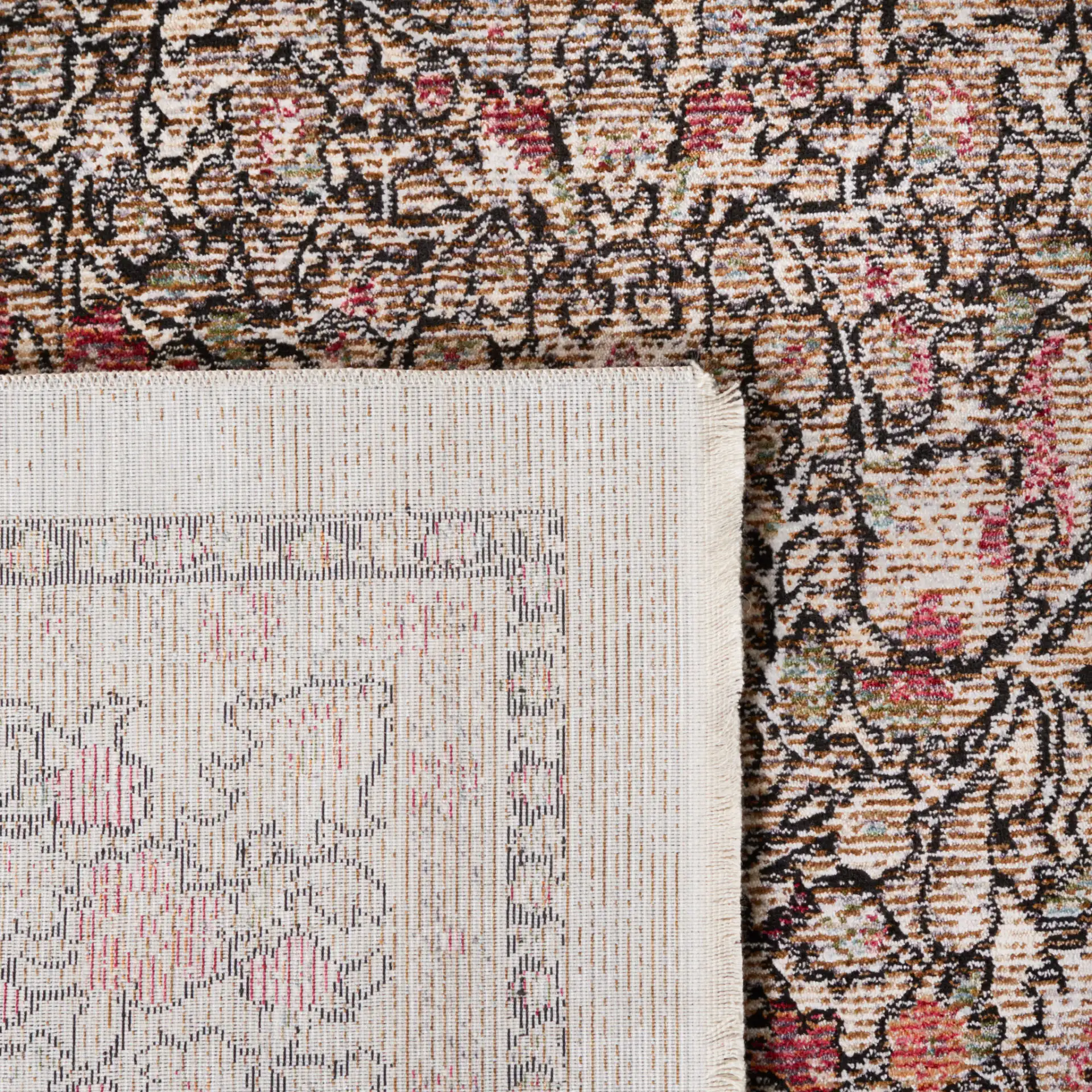 Crimson Bordered Floral Rug in Blue / Black in a styled room