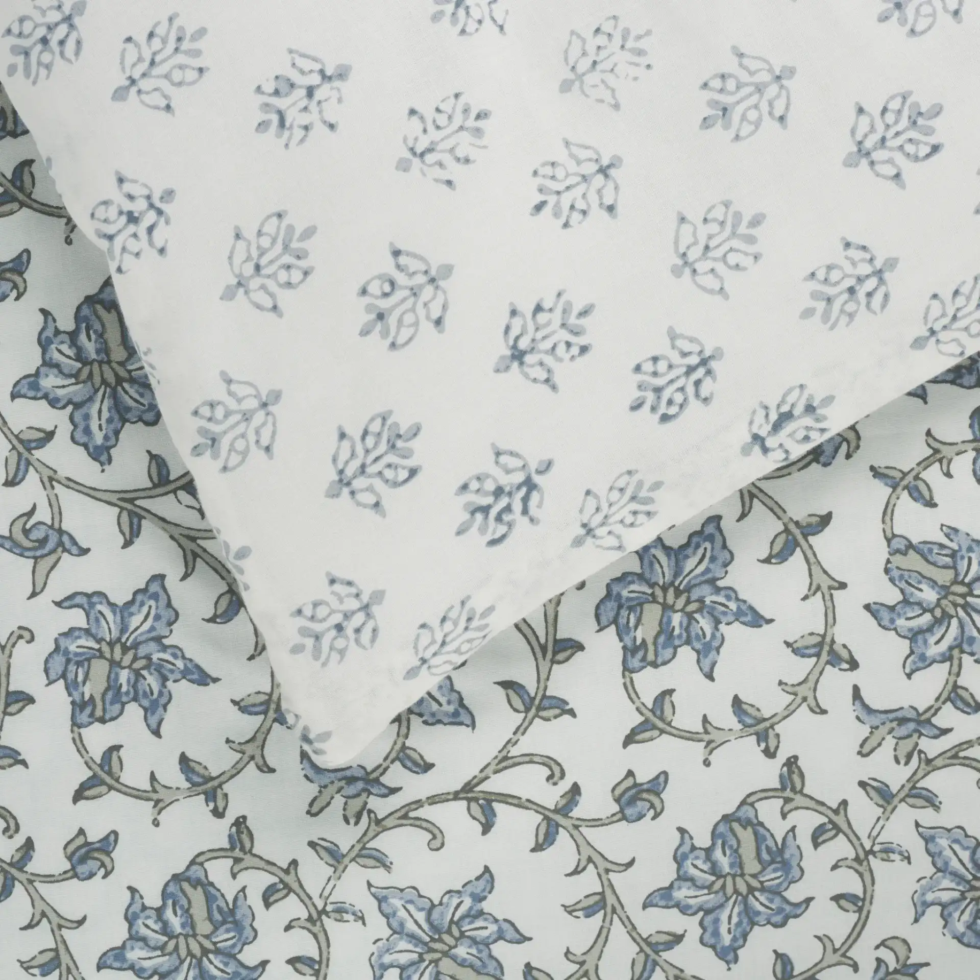 Floral Rev Comforter Set Three-Piece in Blue Mist / Sage Green in a styled room