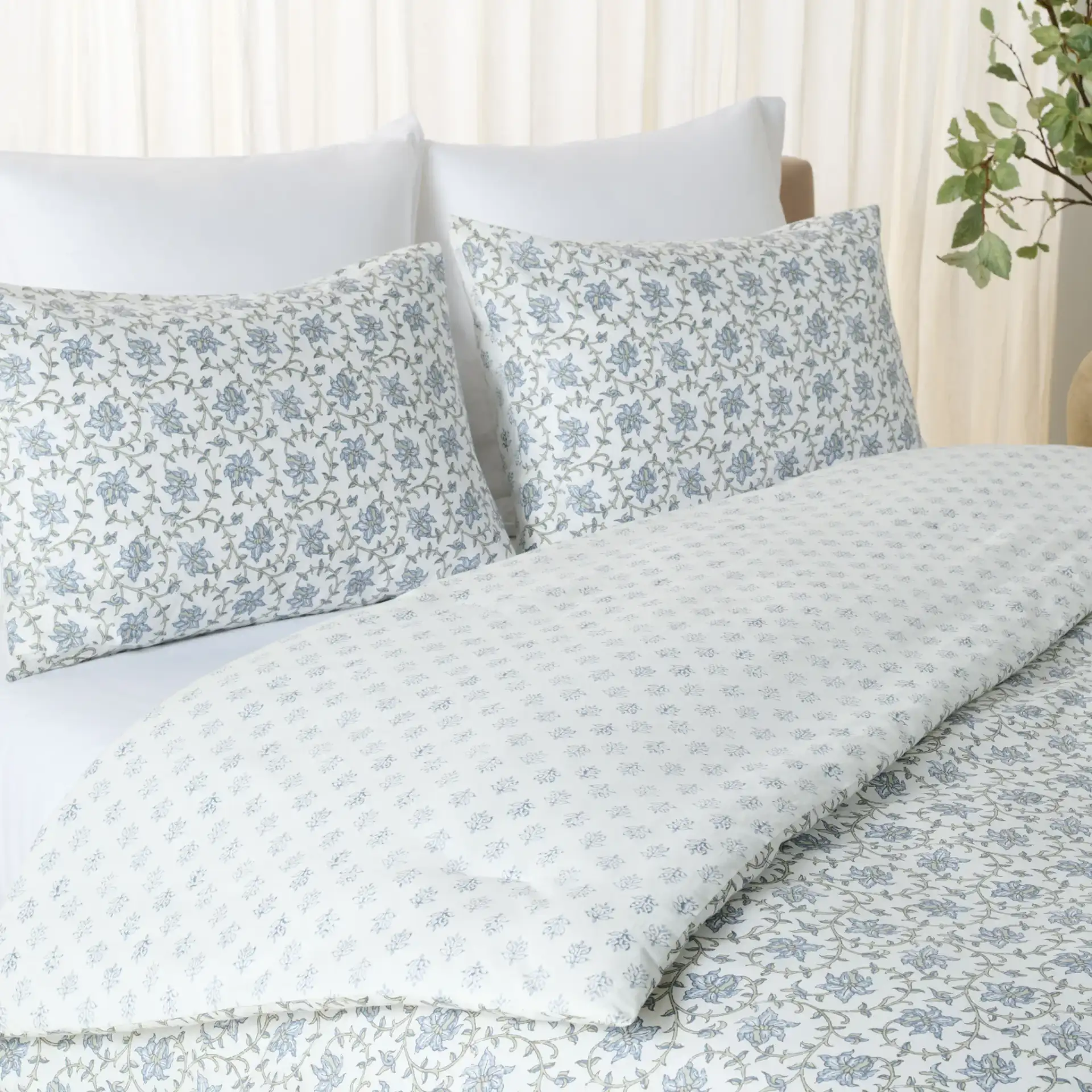 Floral Rev Comforter Set Three-Piece in Blue Mist / Sage Green in a styled room