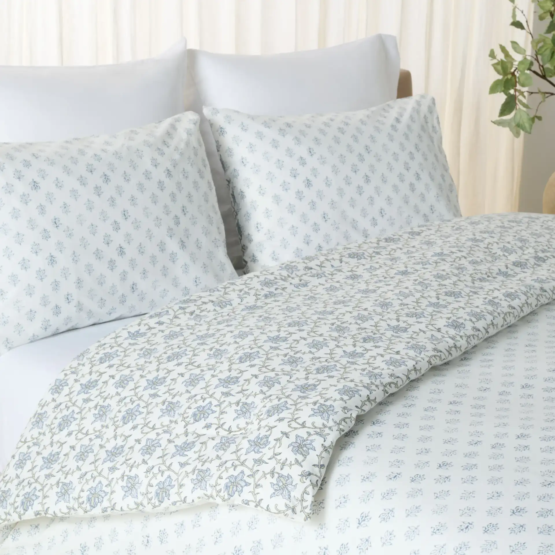 Floral Rev Comforter Set Three-Piece in Blue Mist / Sage Green in a styled room
