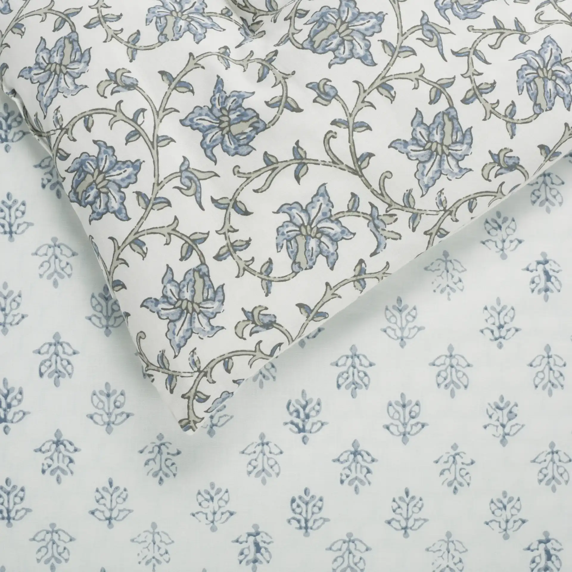 Floral Rev Comforter Set Three-Piece in Blue Mist / Sage Green in a styled room