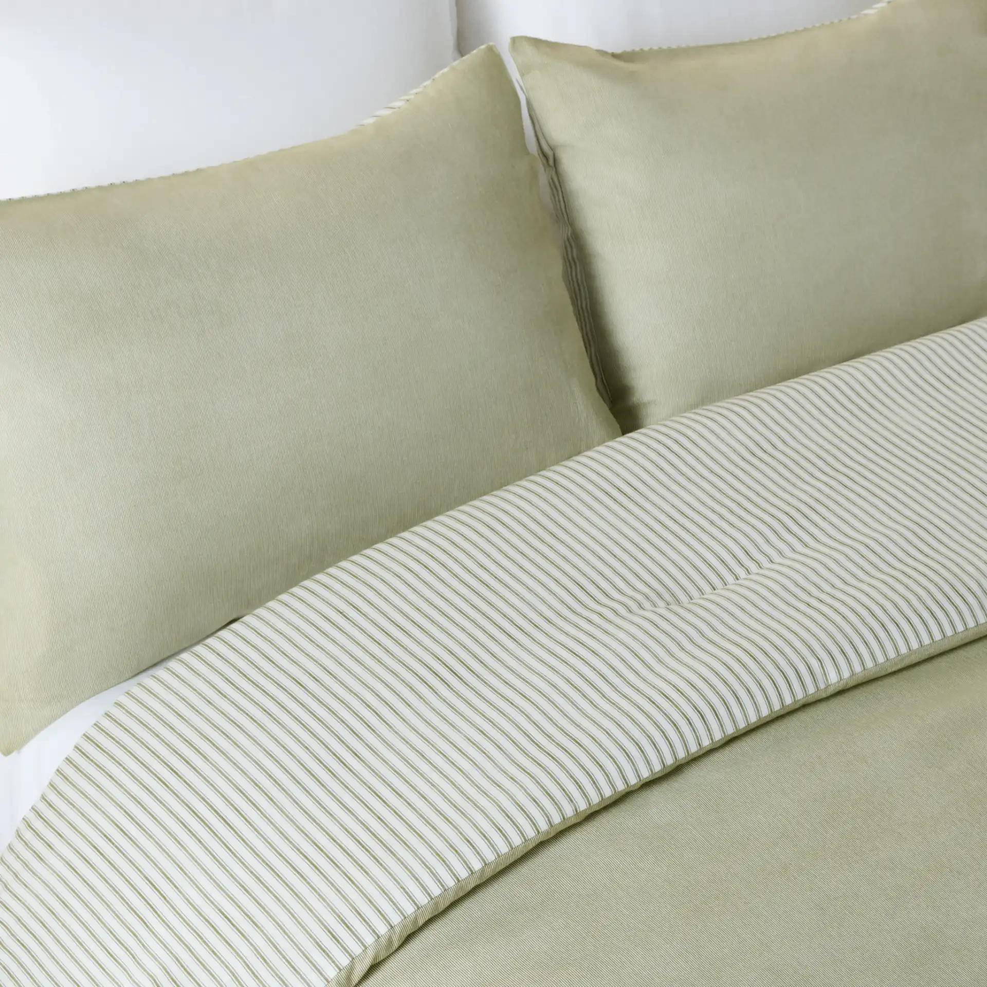 Stripe Rev Comforter Set Three-Piece in Olive / White in a styled room
