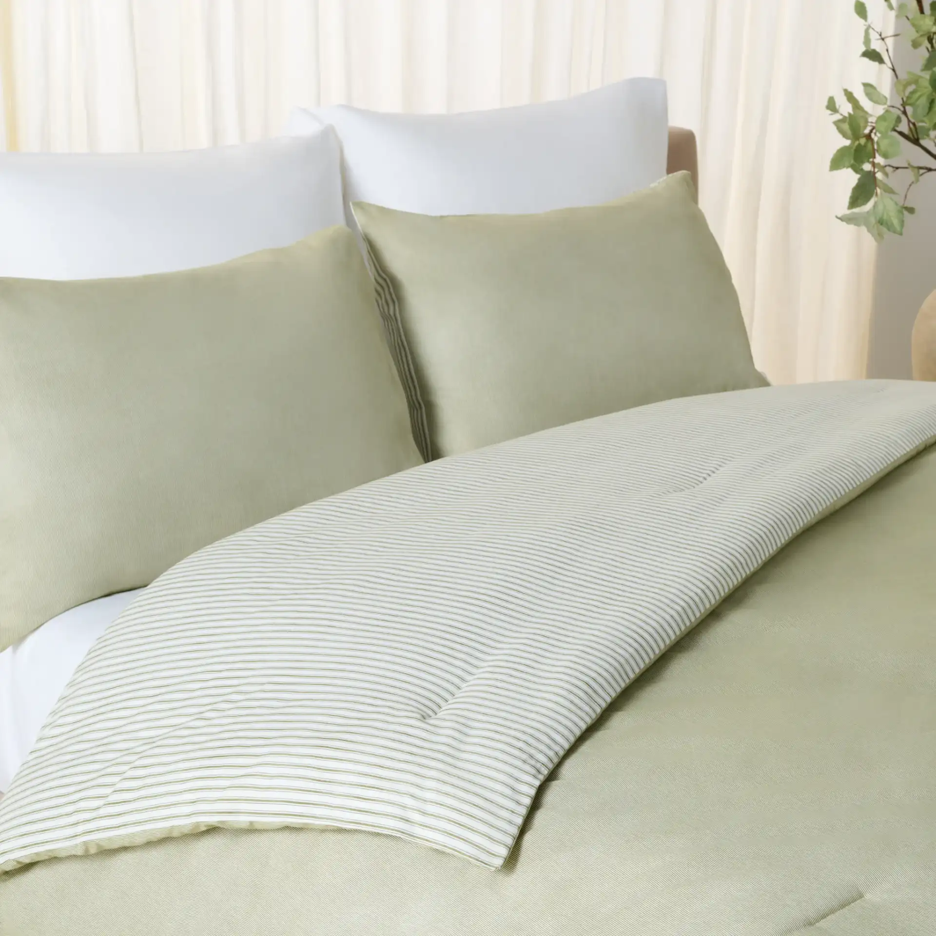 Stripe Rev Comforter Set Three-Piece in Olive / White in a styled room