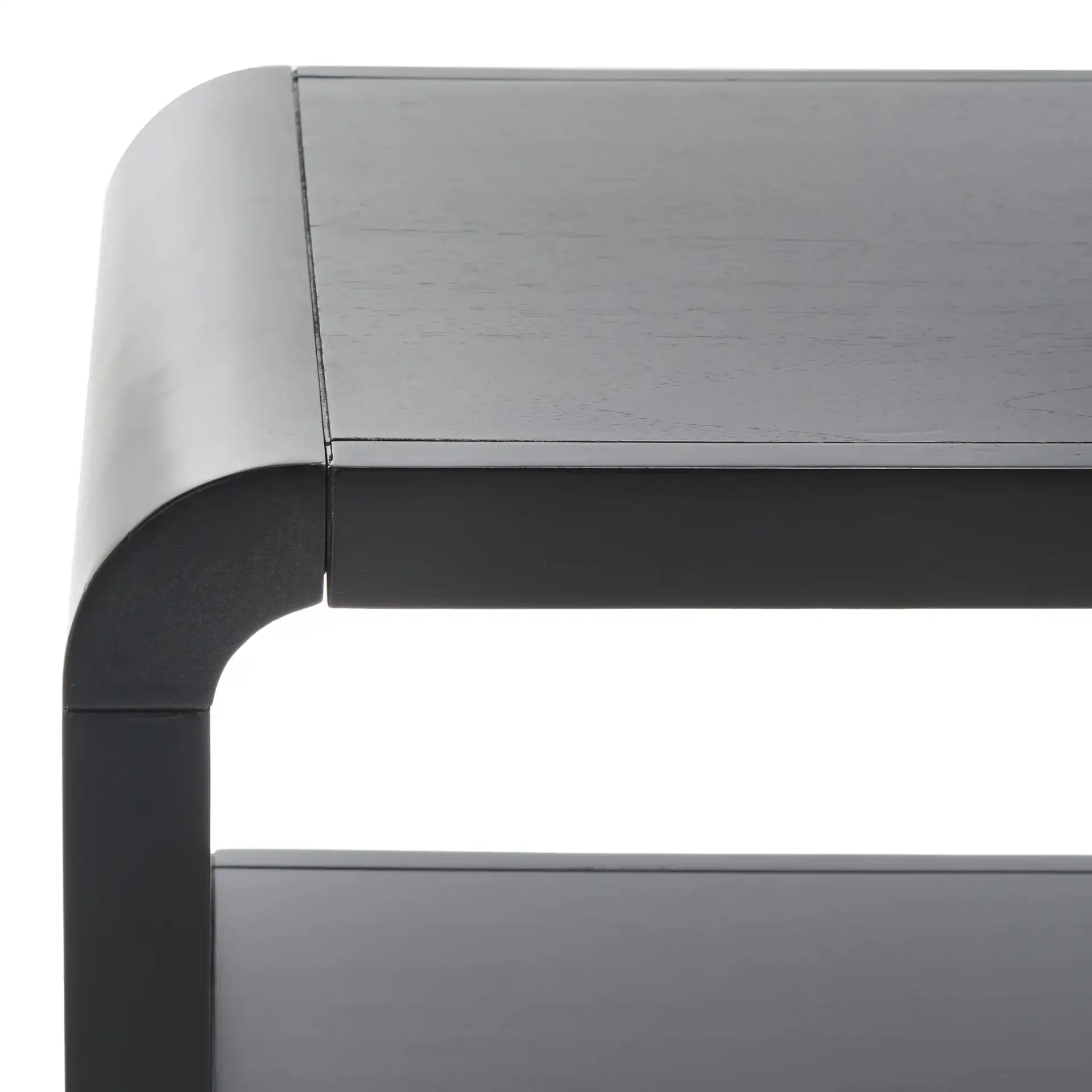 Omara Three-Tier Console Table in Black in a styled room