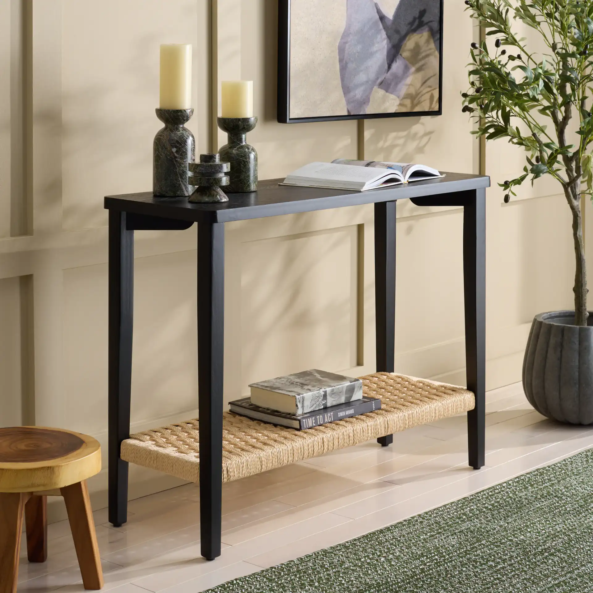 Chasu One-Shelf Console Table in Black in a styled room