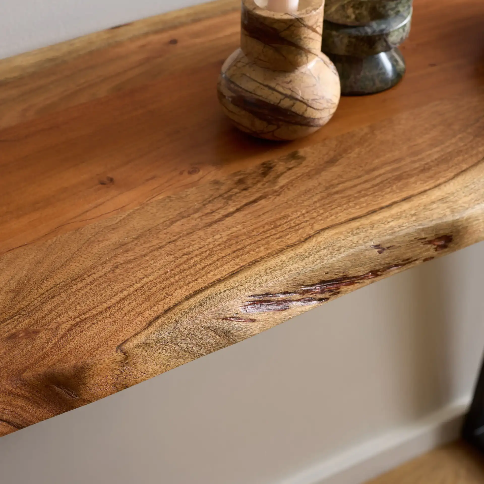 Adella Wood Console Table in Natural / Black in a styled room