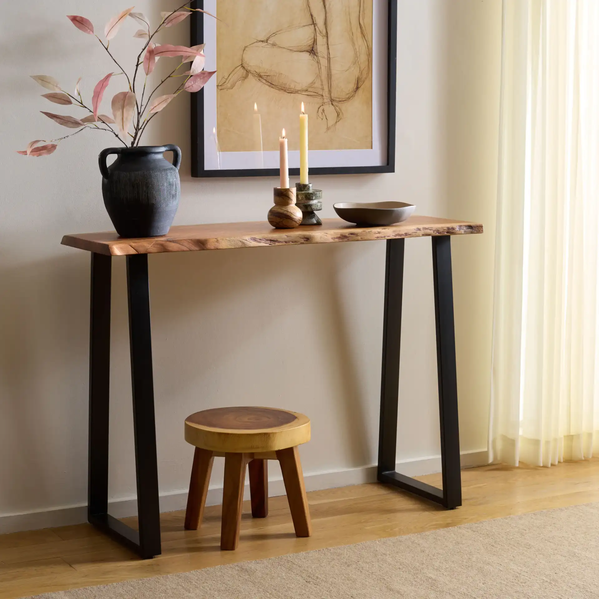 Adella Wood Console Table in Natural / Black in a styled room