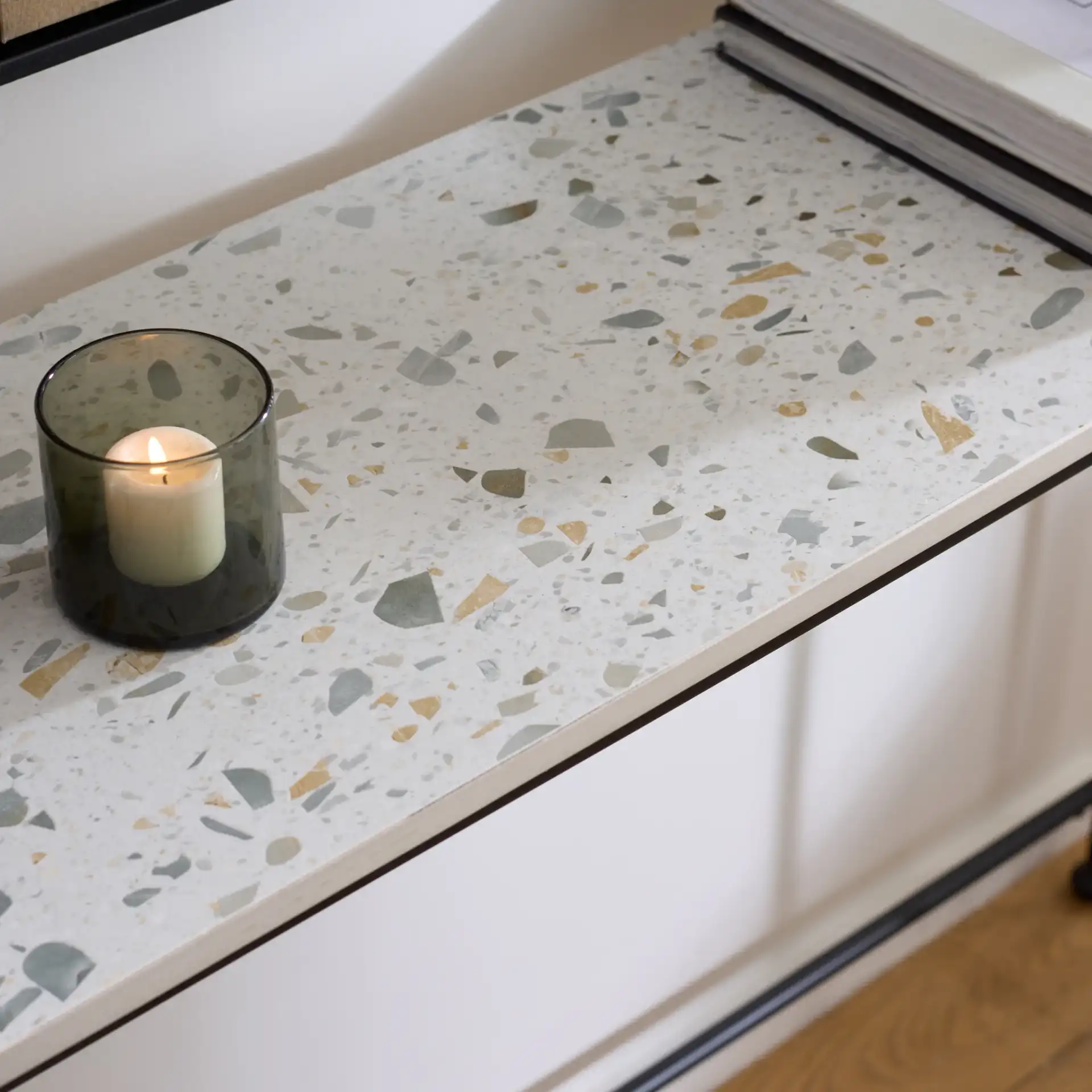Amelina Ceramic Console Table in Gray / Black in a styled room